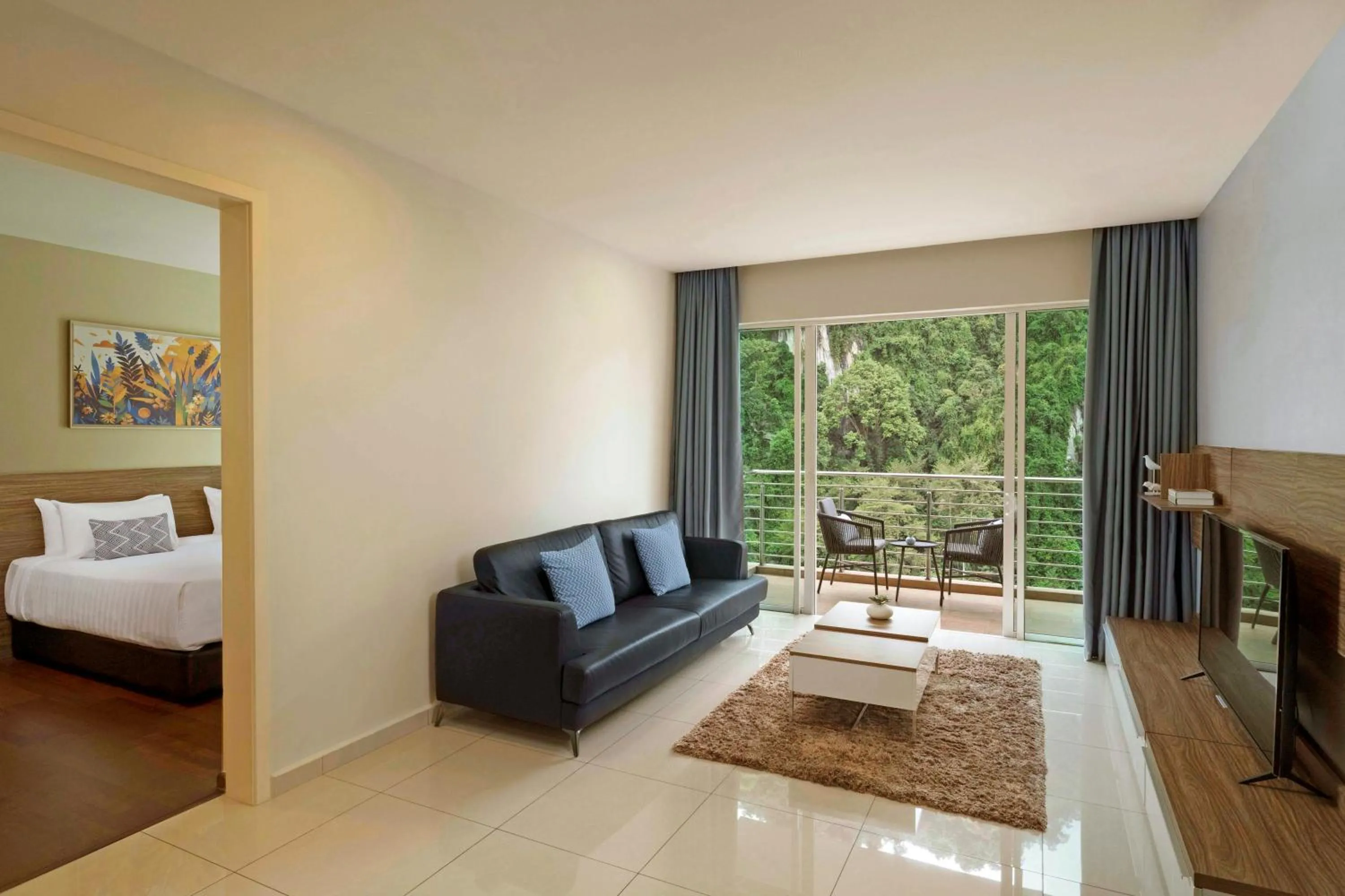 Living room, Bed in TUI BLUE The Haven Ipoh