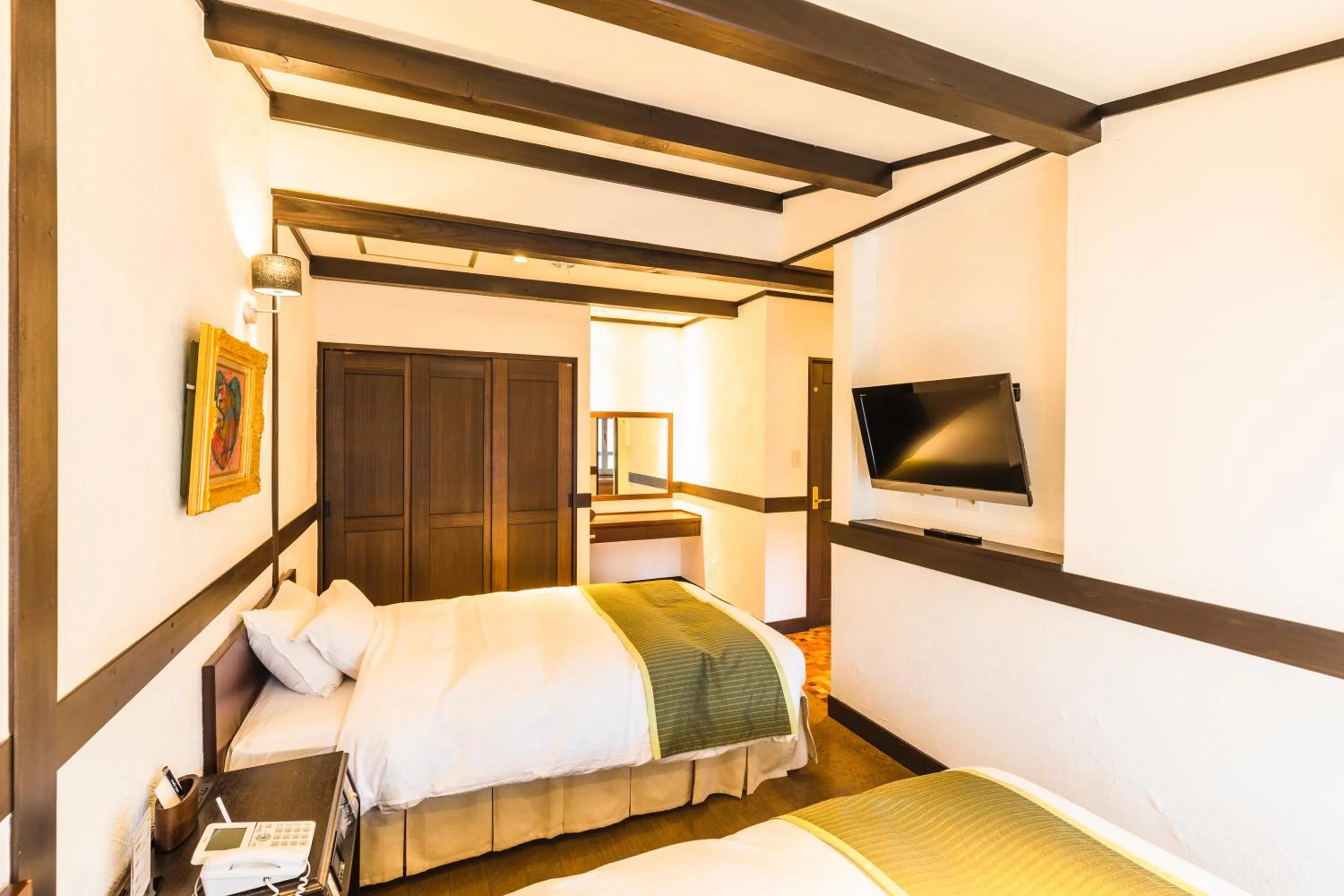 Bed in Hotel Jogakura