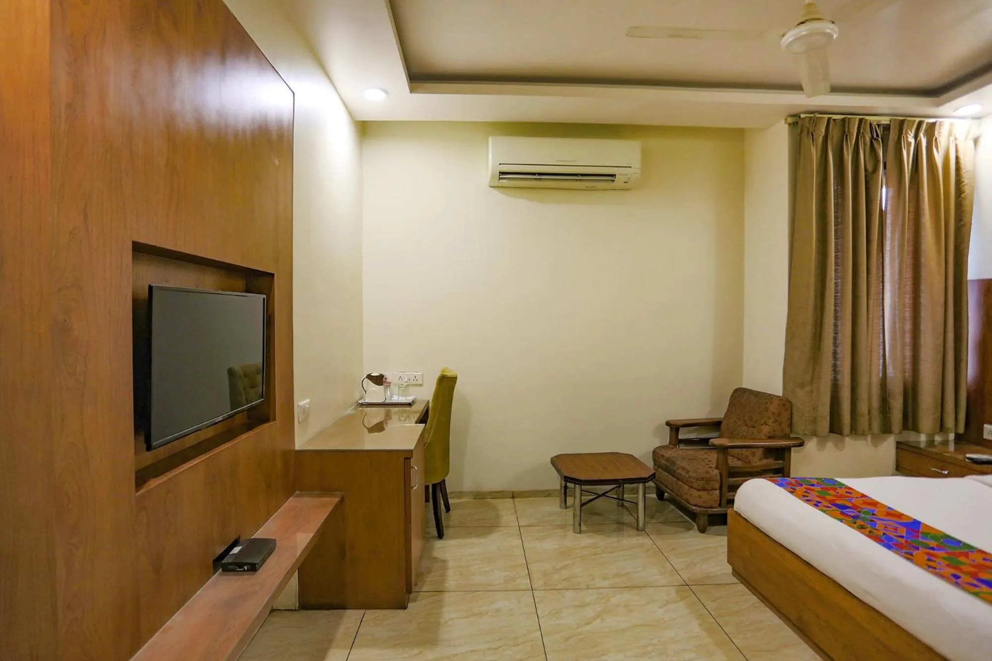 Bed in FabHotel Surya