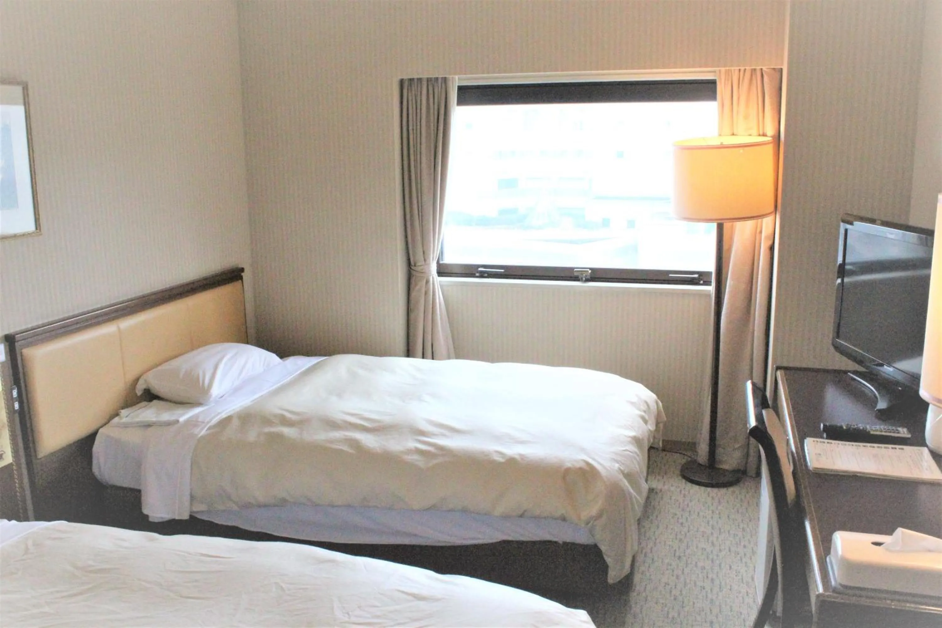 Photo of the whole room, Bed in Hotel Grand Terrace Toyama