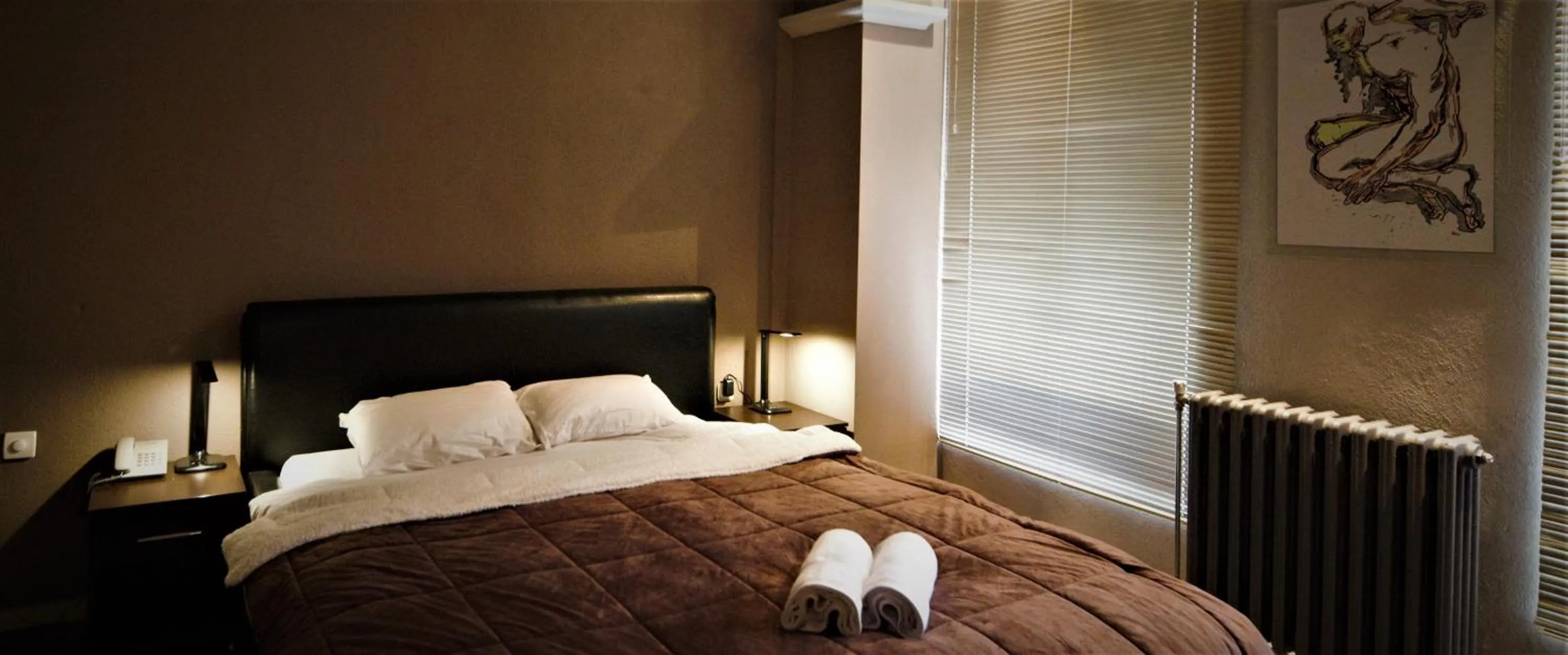 Bed in Hotel Ambasador