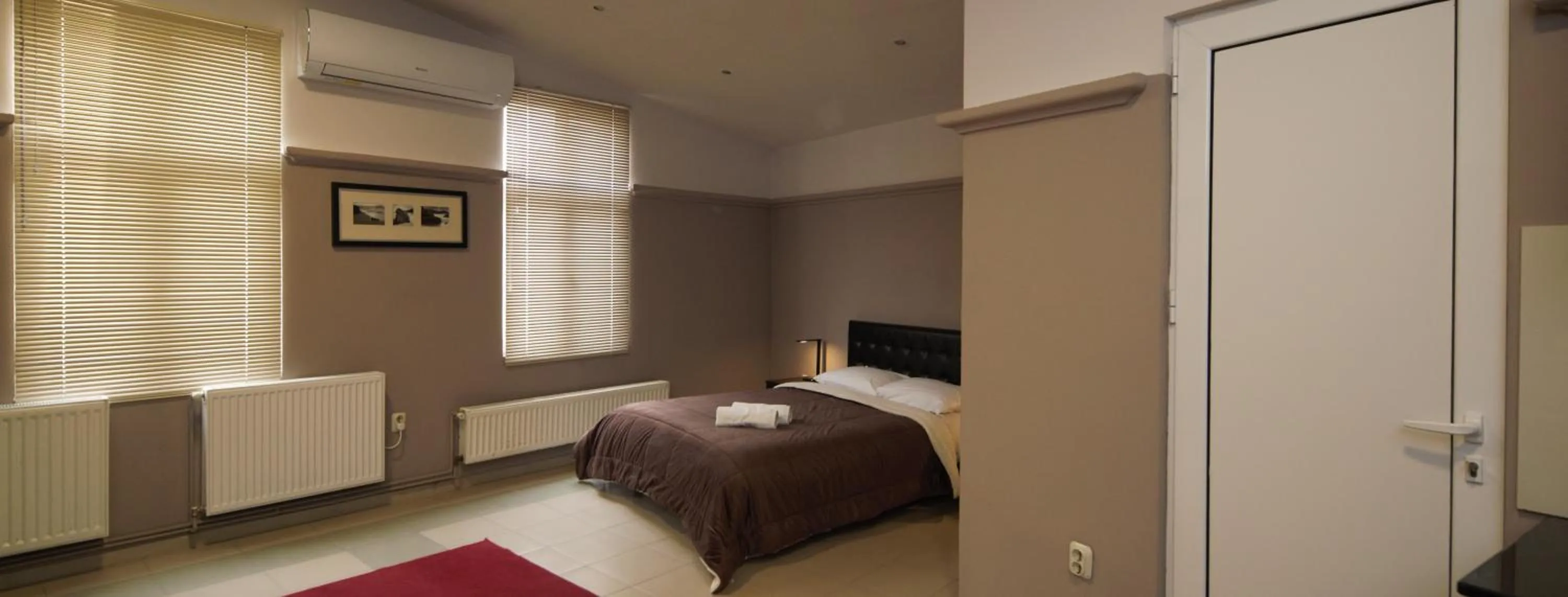 Bed in Hotel Ambasador