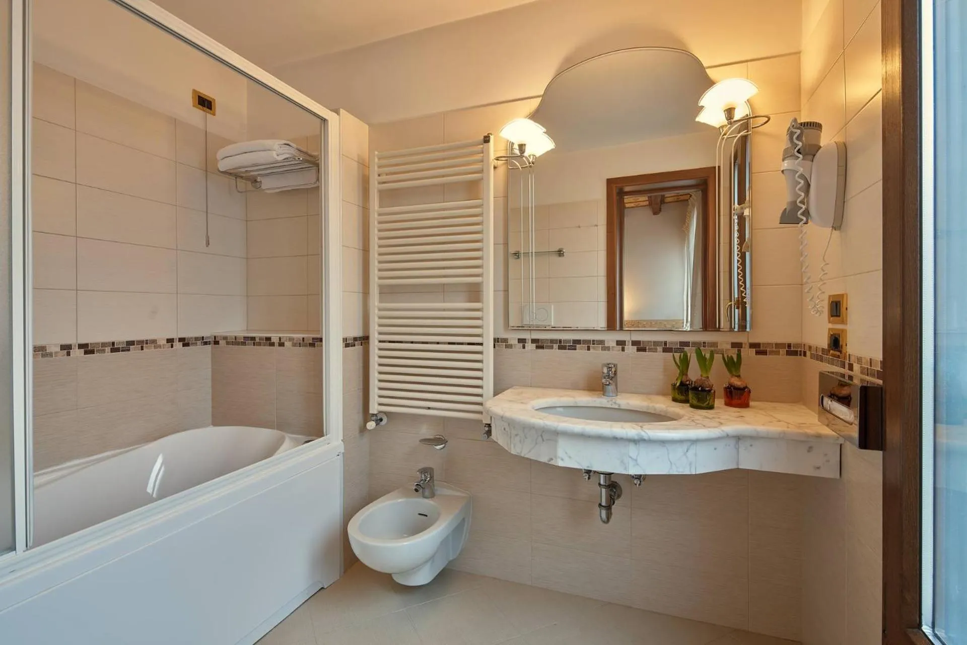 Bathroom in UNAHOTELS Ala Venezia-Adults 16