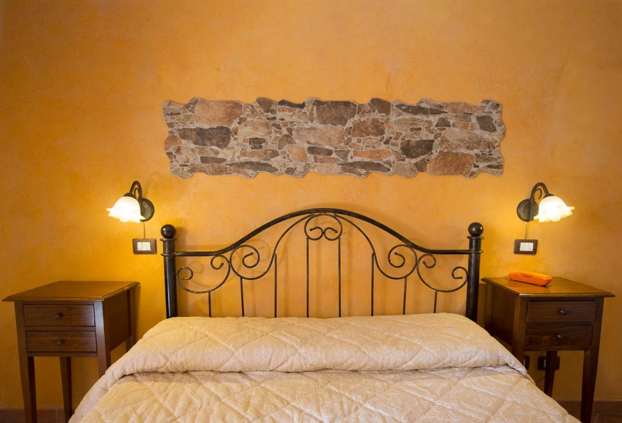 Bed in Sikania Suite