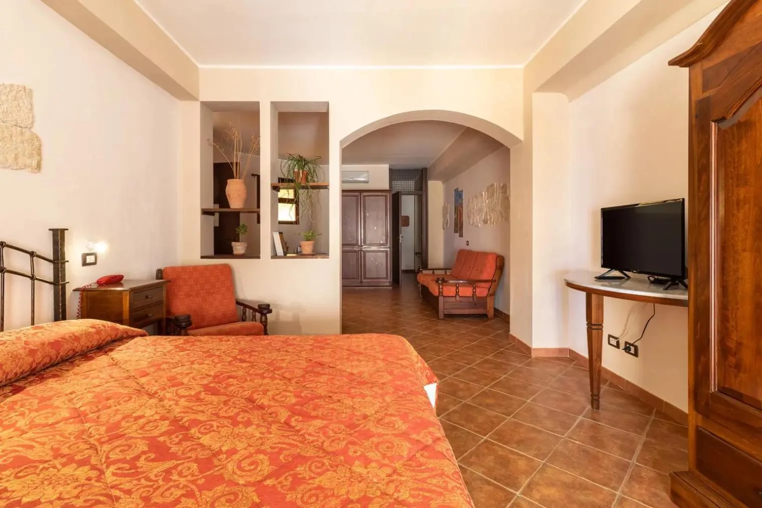 Bed in Sikania Suite