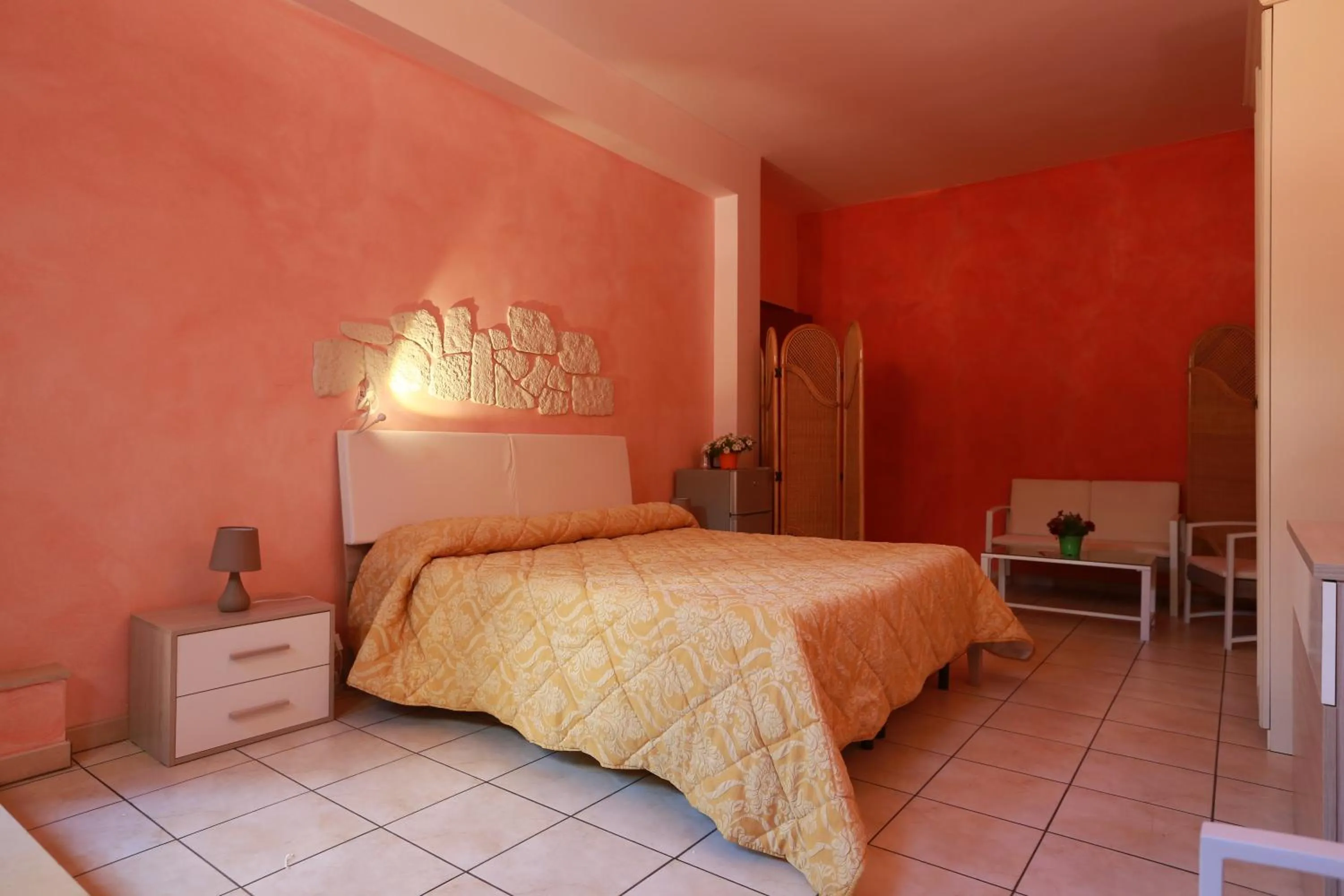 Bed in Sikania Suite