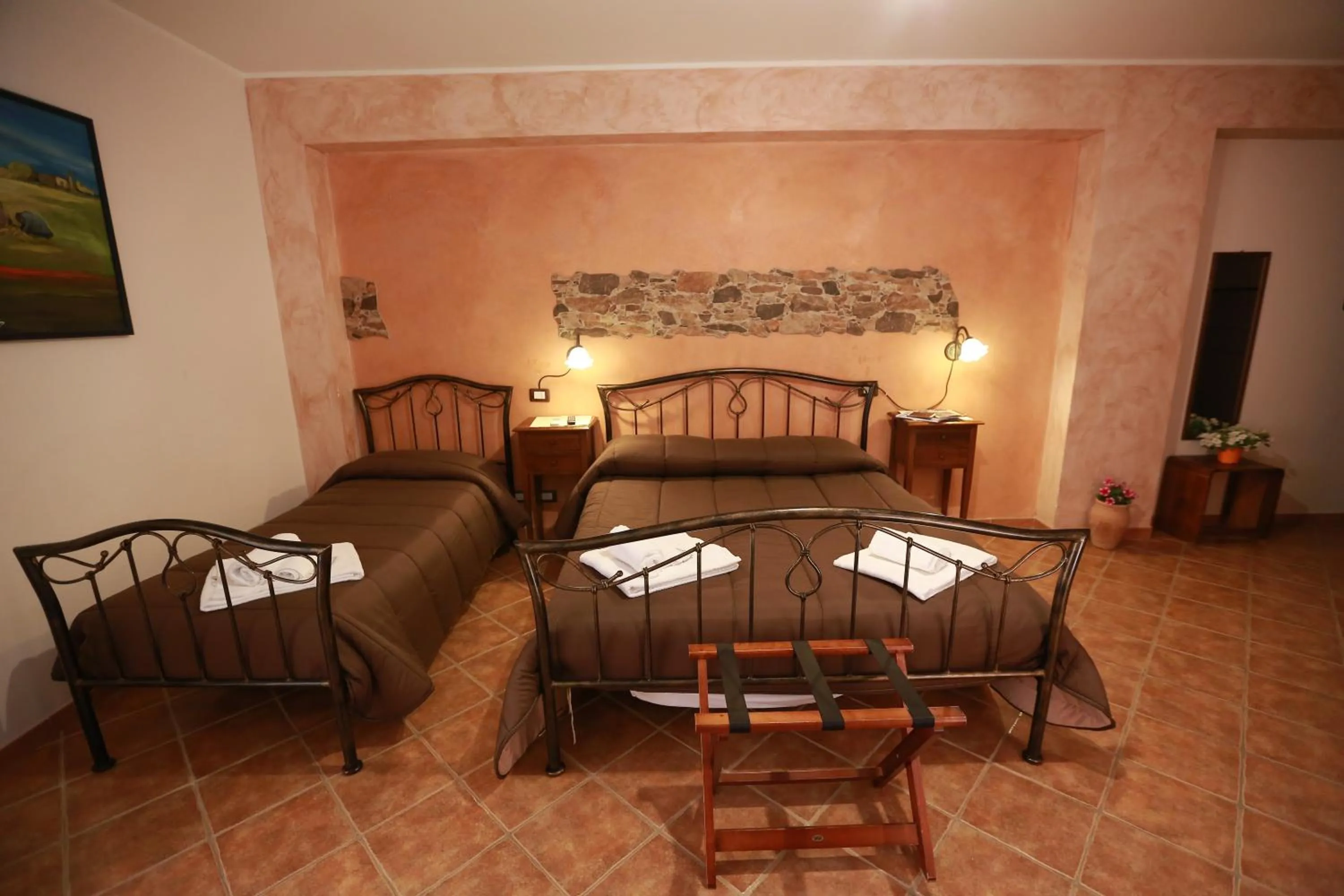 Bed in Sikania Suite