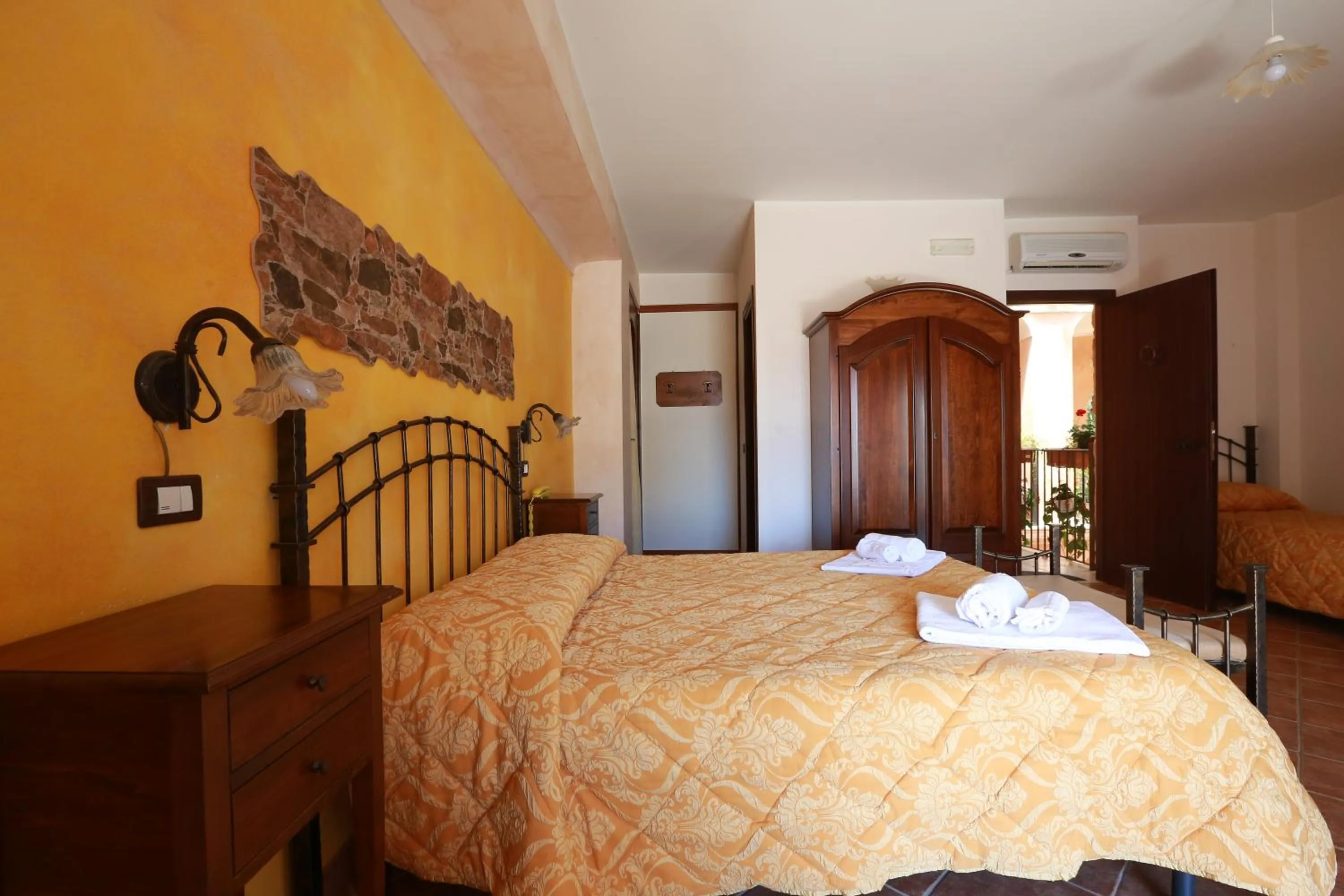 Bed in Sikania Suite