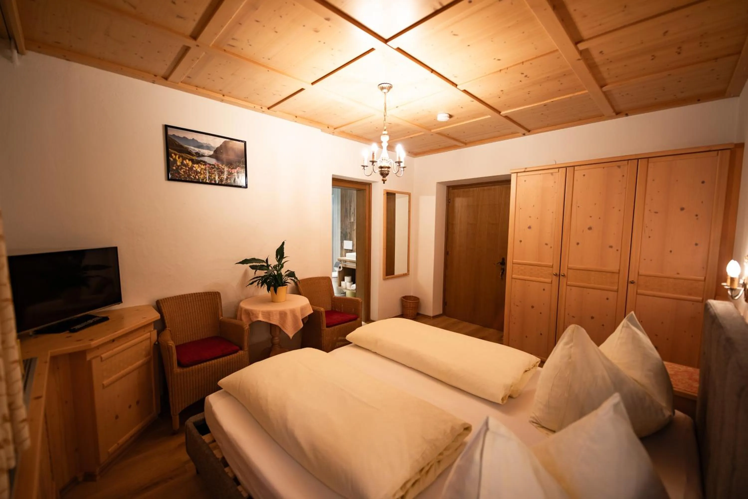 Bed in Zimmer & Ferienwohnungen Dandler