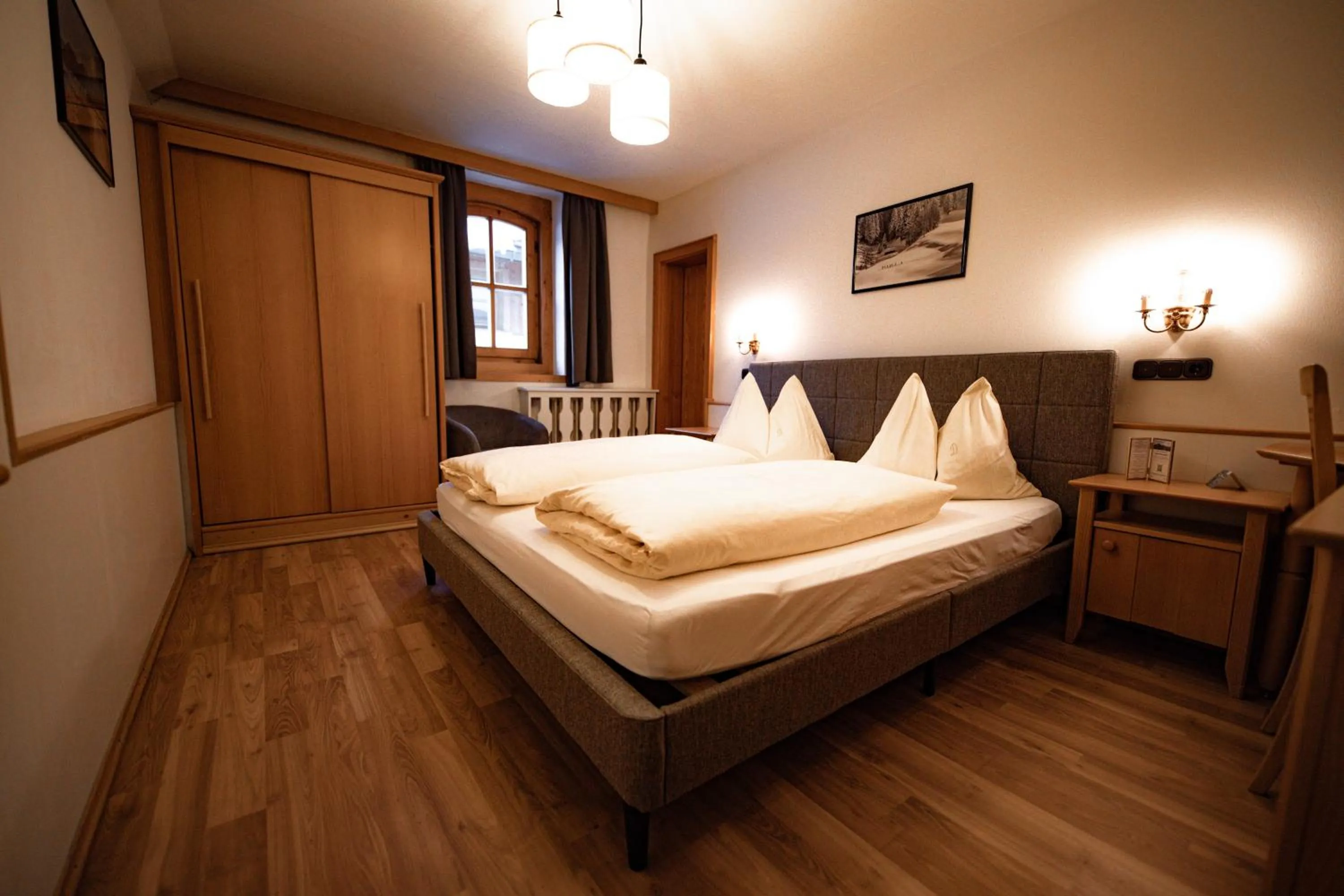 Bed in Zimmer & Ferienwohnungen Dandler