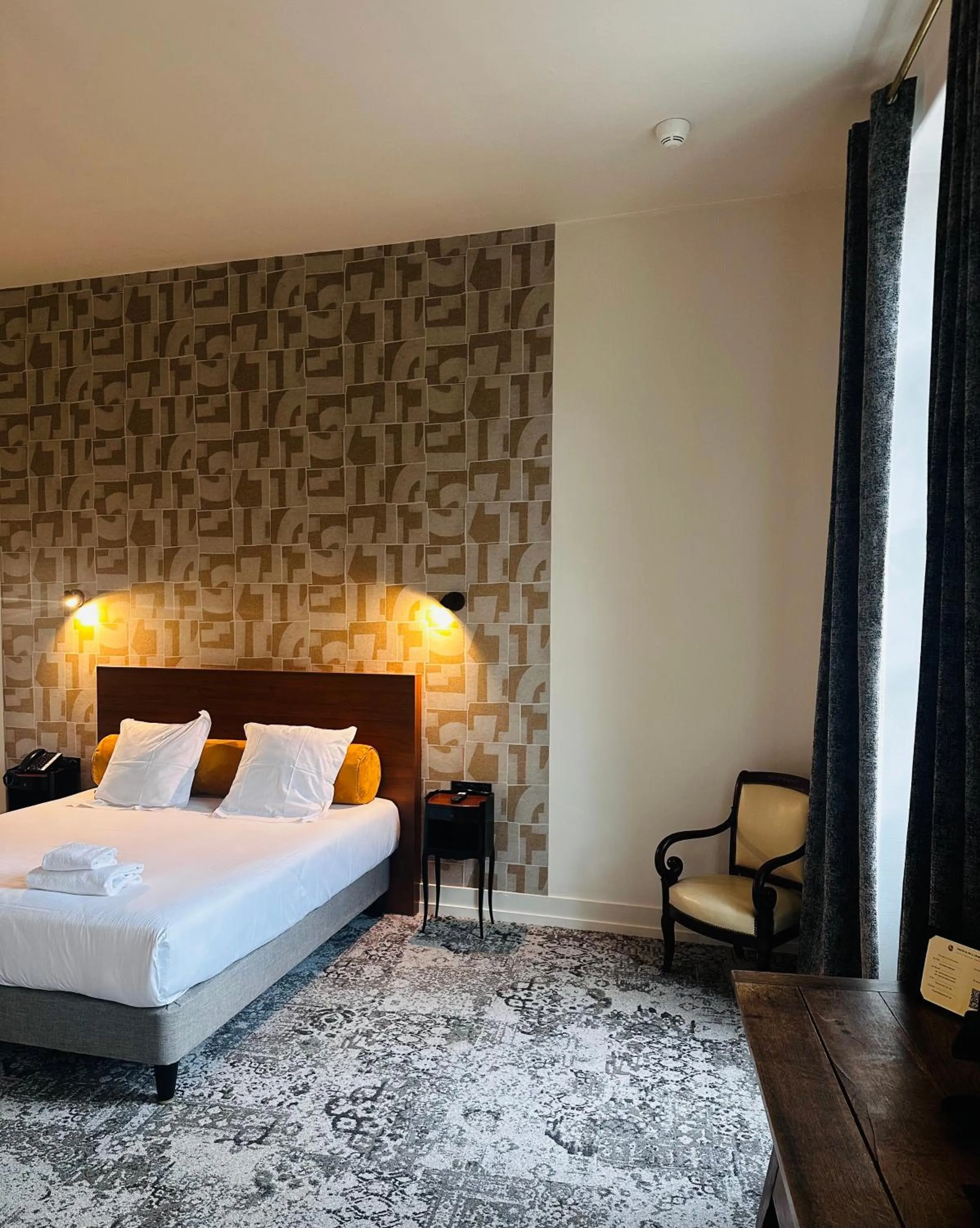 Bed in Logis Hôtels Château de La Barge