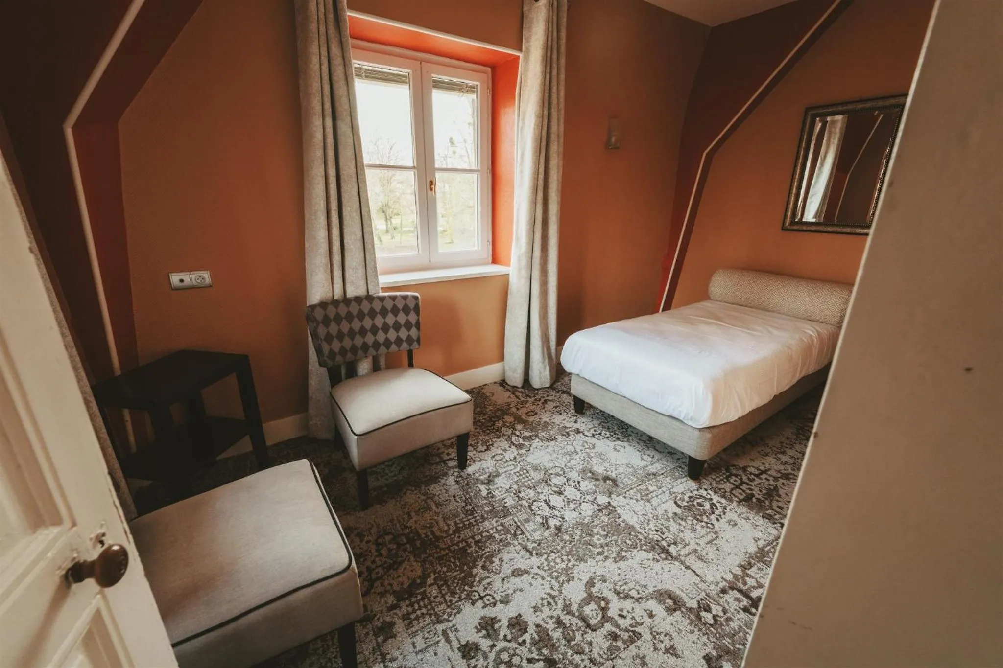 Bed in Logis Hôtels Château de La Barge