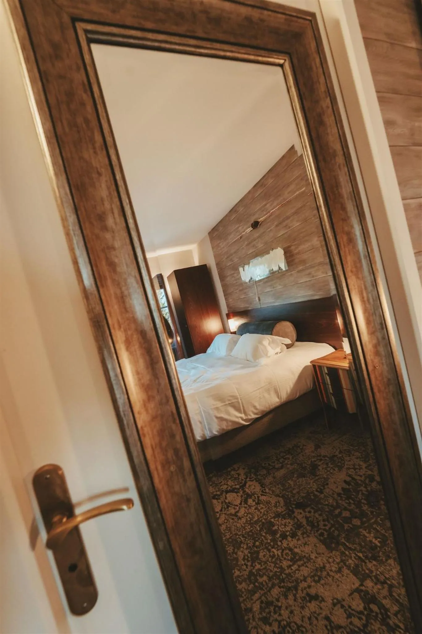 Bed in Logis Hôtels Château de La Barge