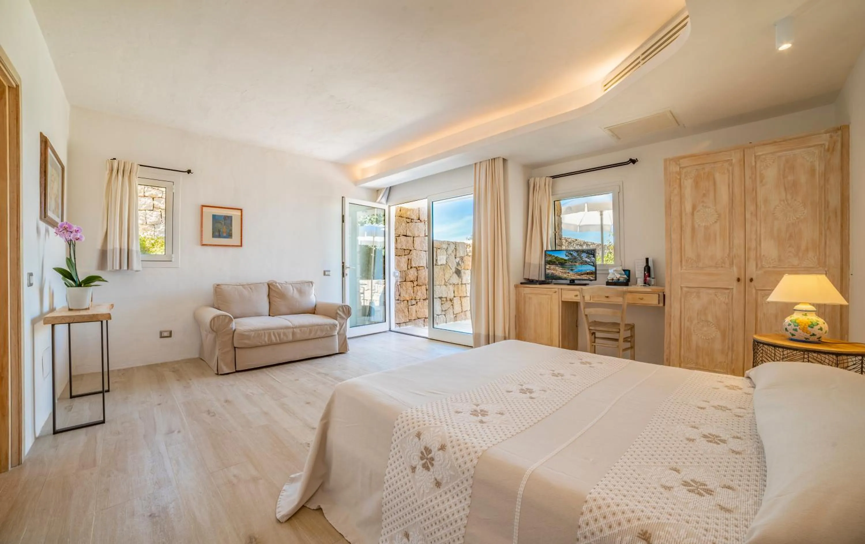 Bed in Hotel Grand Relais Dei Nuraghi