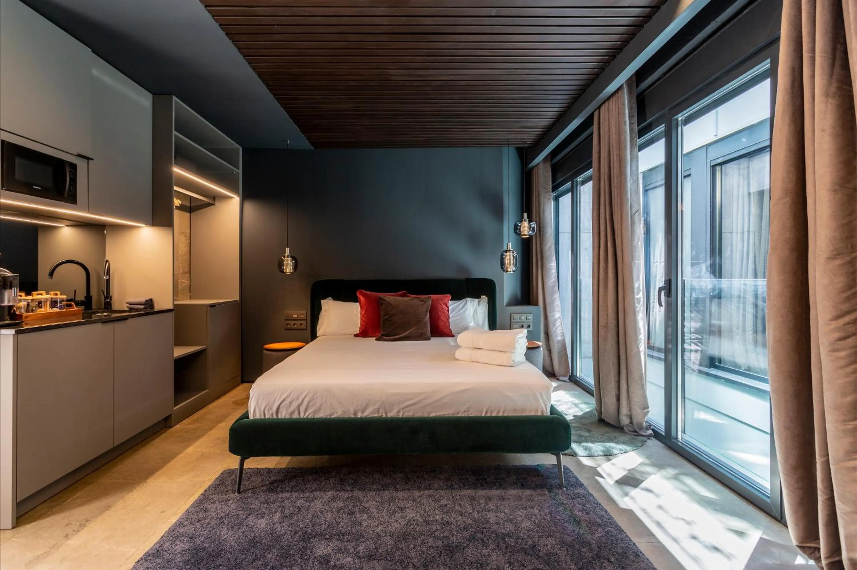 Bed in Apartaestudios Evolution Luxury