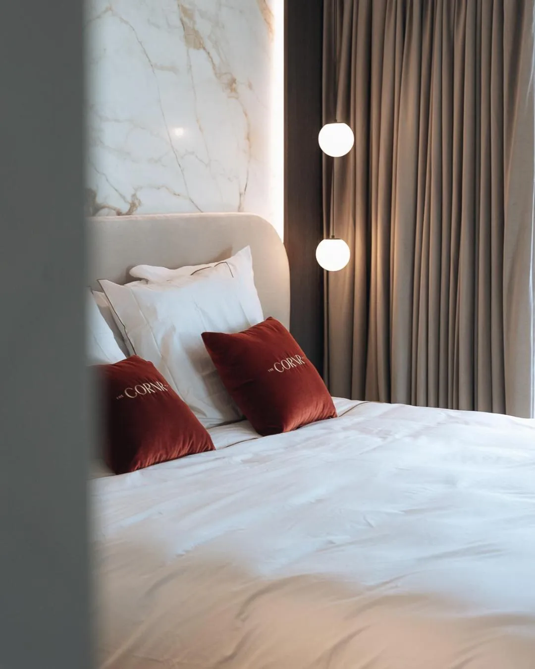 Bed in The CORNR Hotel