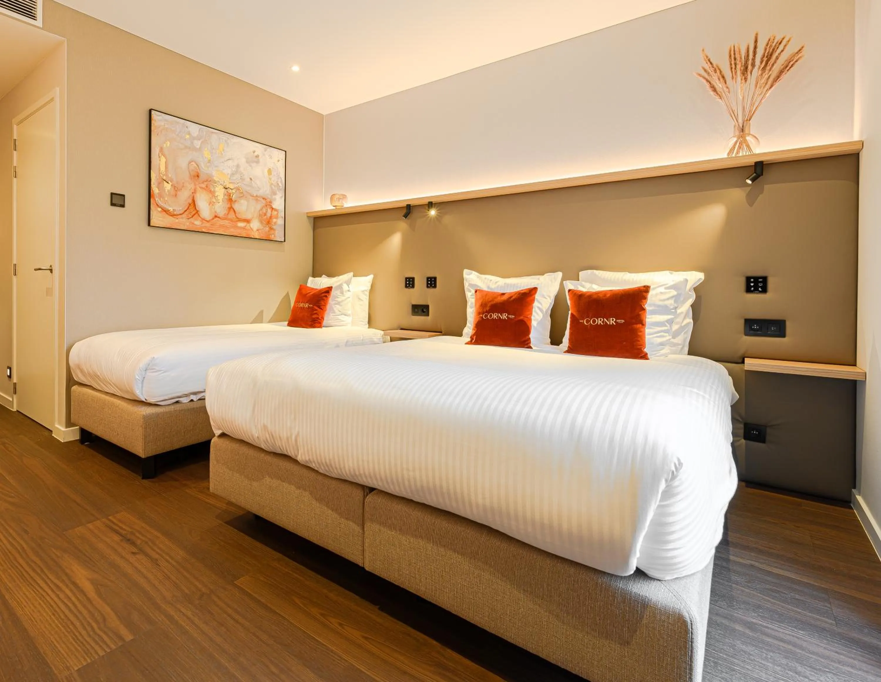 Bed in The CORNR Hotel