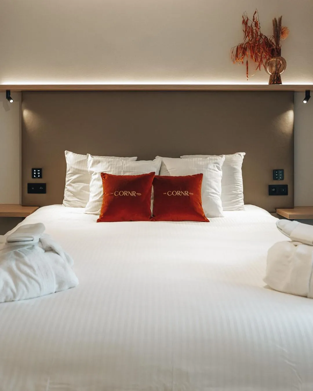 Bed in The CORNR Hotel