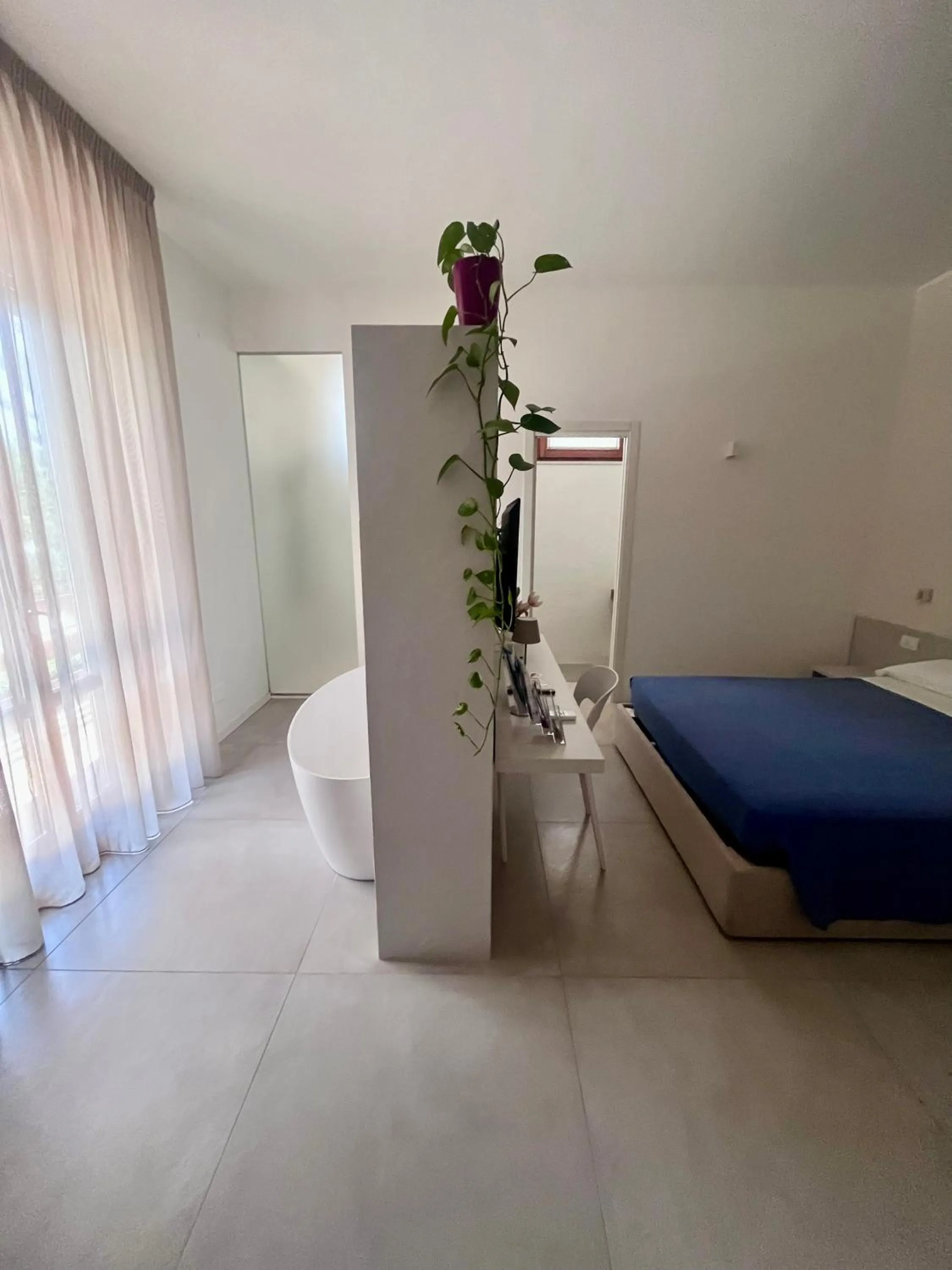 Photo of the whole room, Bed in B&B LE MAGNOLIE