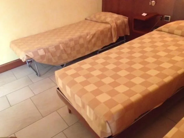 Bed in Albergo Ristorante San Marco