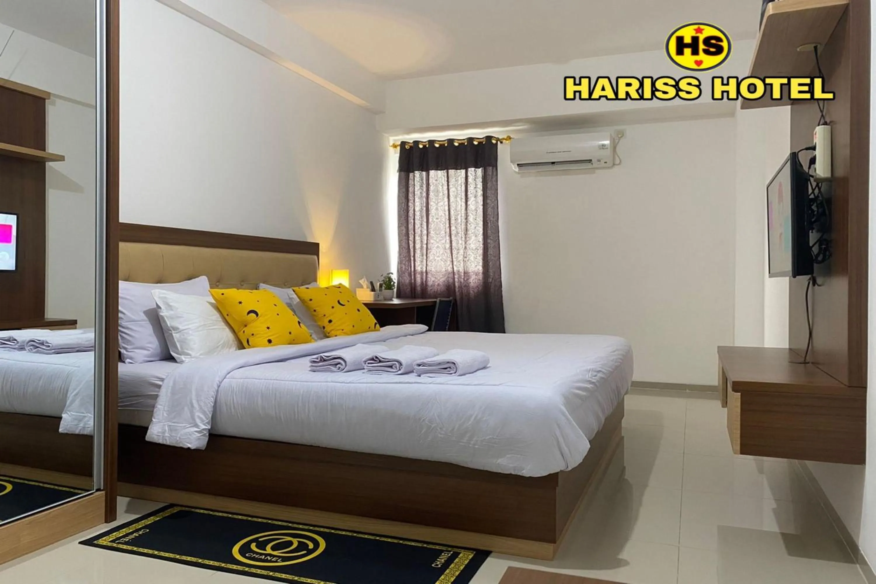 Bedroom in Hariss Inn Bandara
