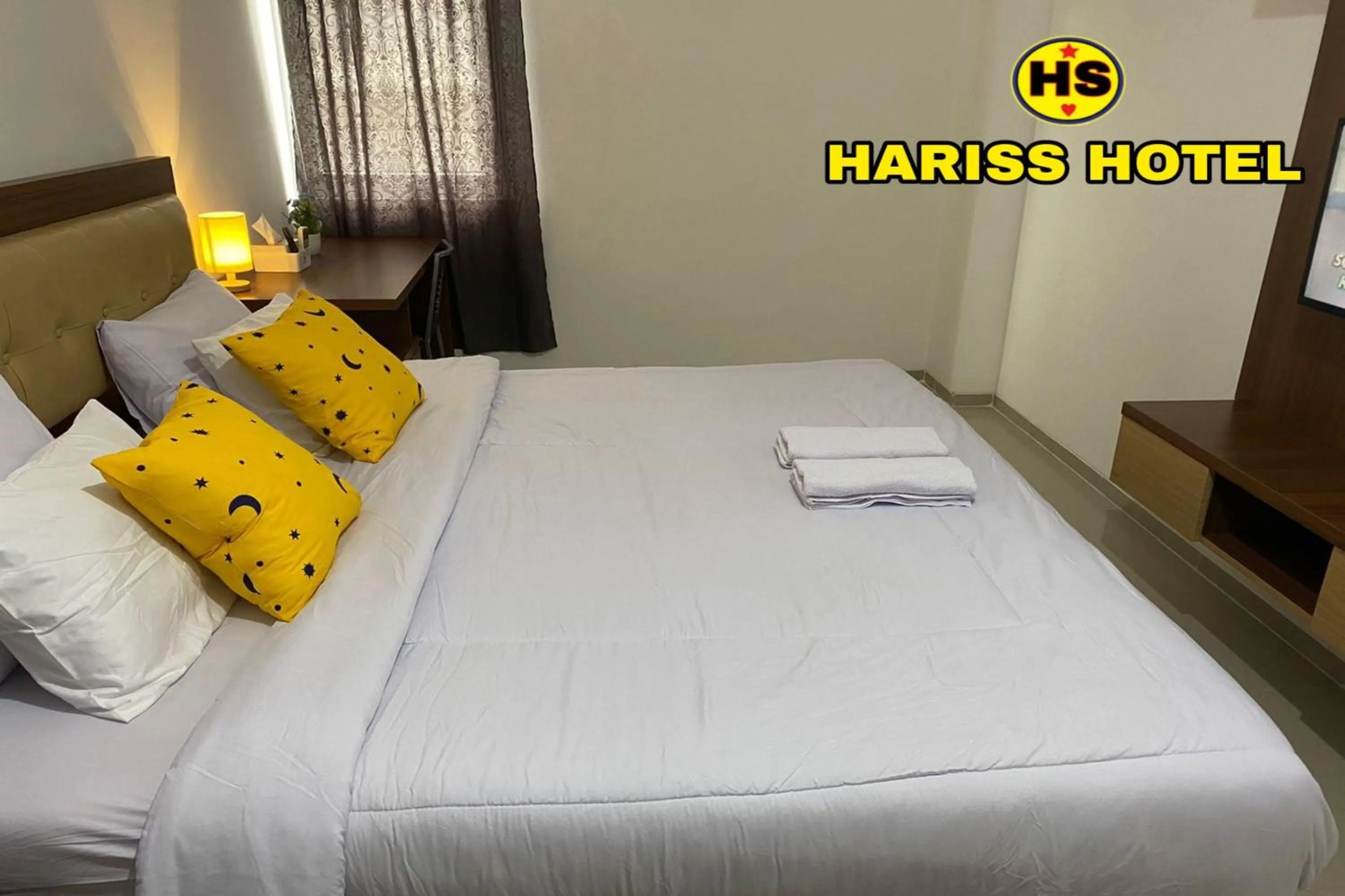 Bedroom in Hariss Inn Bandara