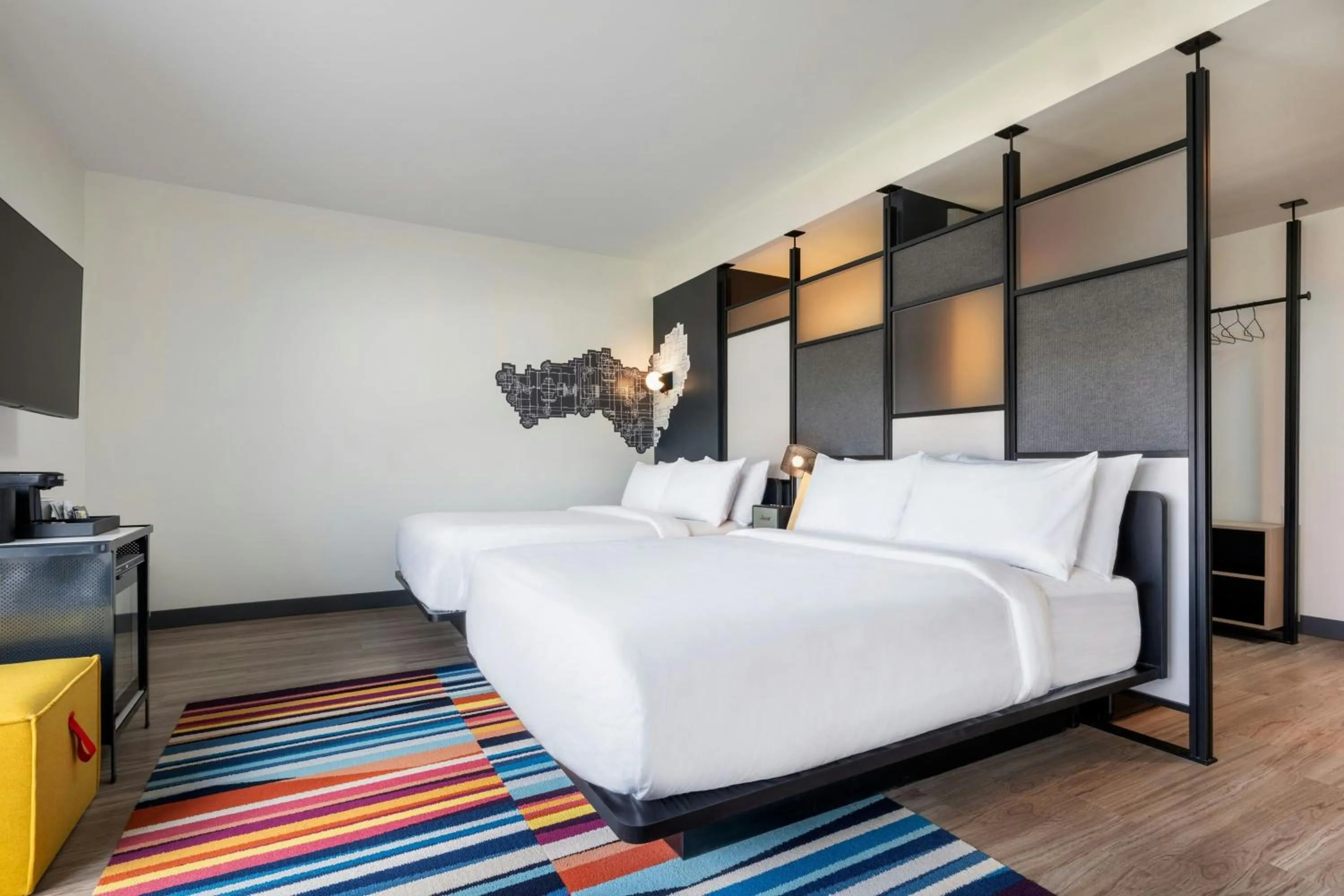 Photo of the whole room, Bed in Aloft Florence