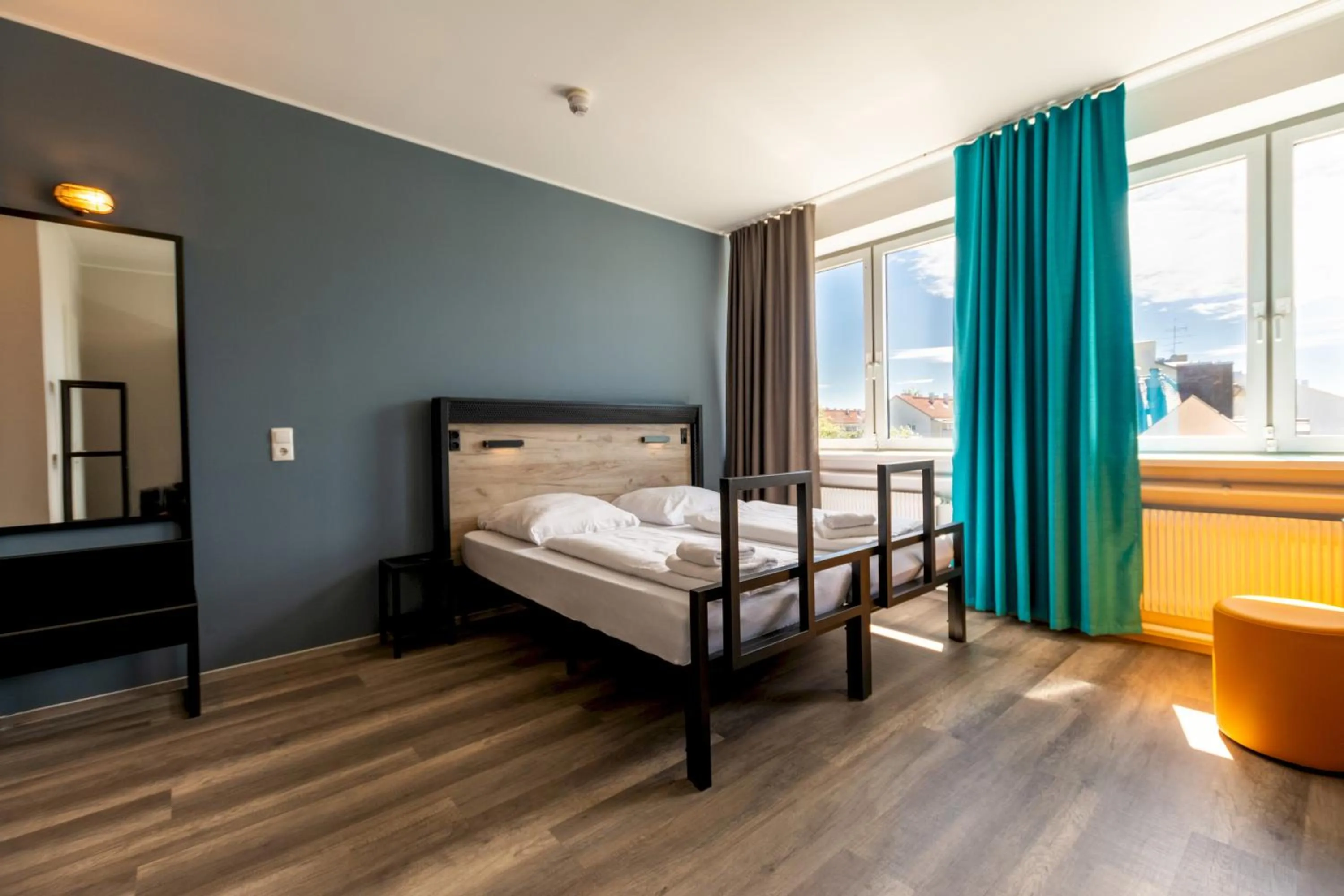 Photo of the whole room, Bed in a&o München Laim