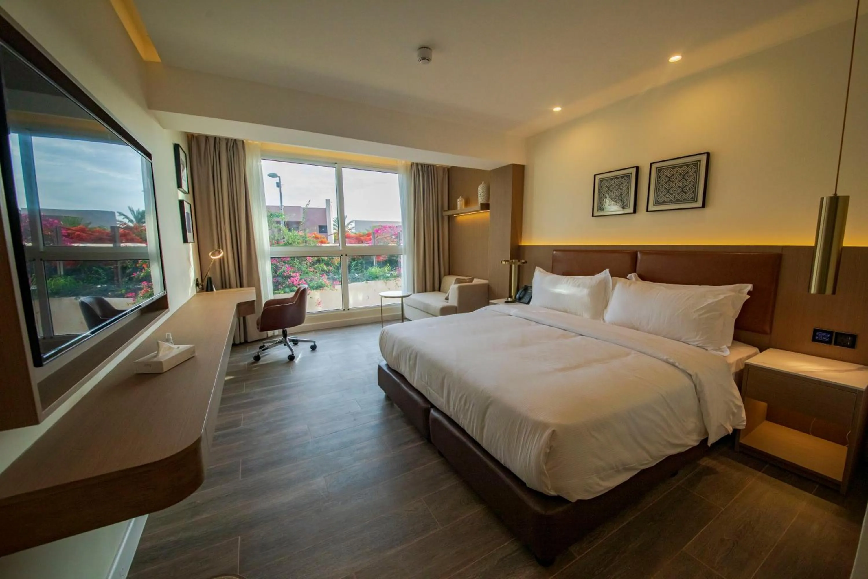 Photo of the whole room, Bed in Luxotel Aqaba Beach Resort & Spa Only 15 years plus