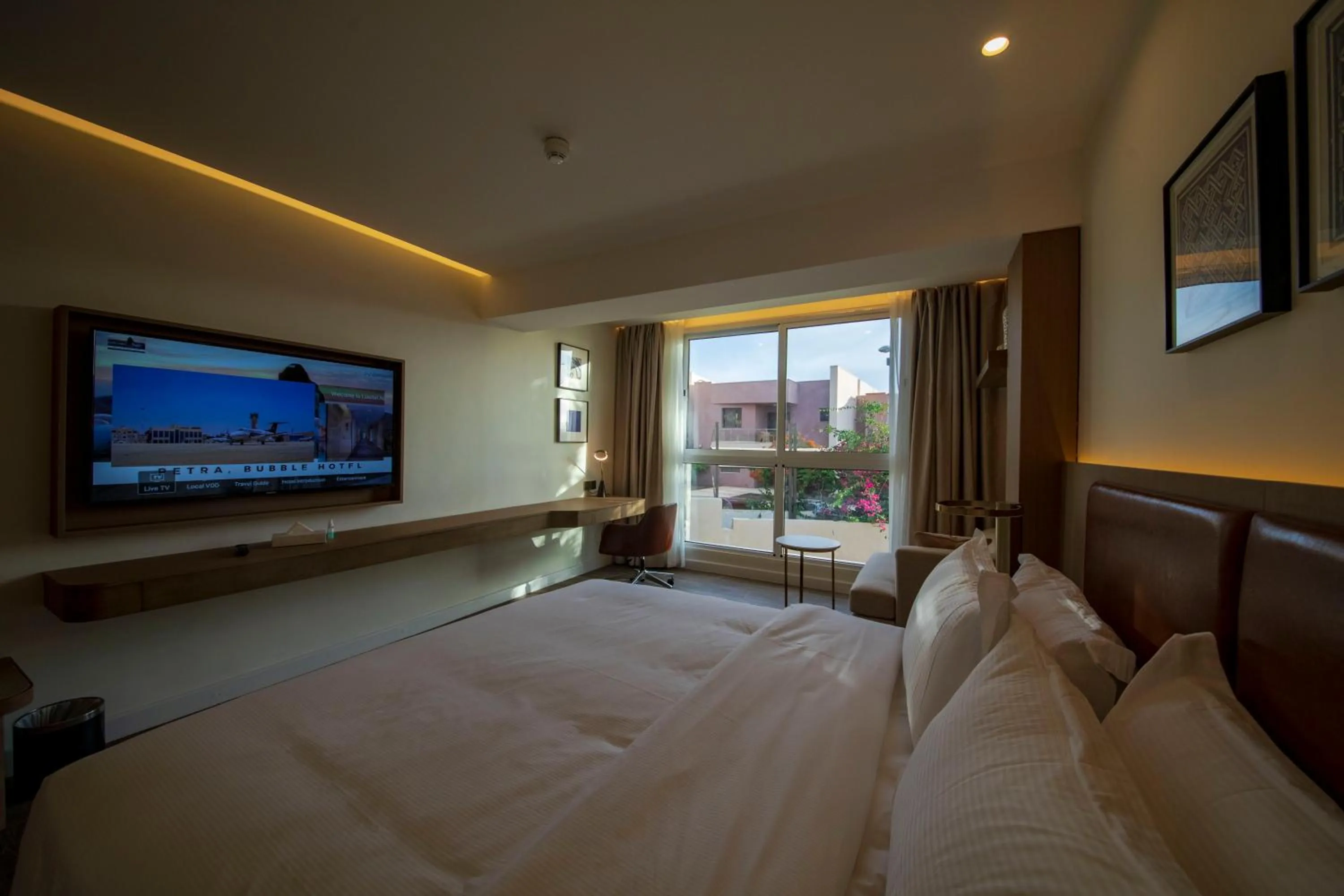 Photo of the whole room, Bed in Luxotel Aqaba Beach Resort & Spa Only 15 years plus