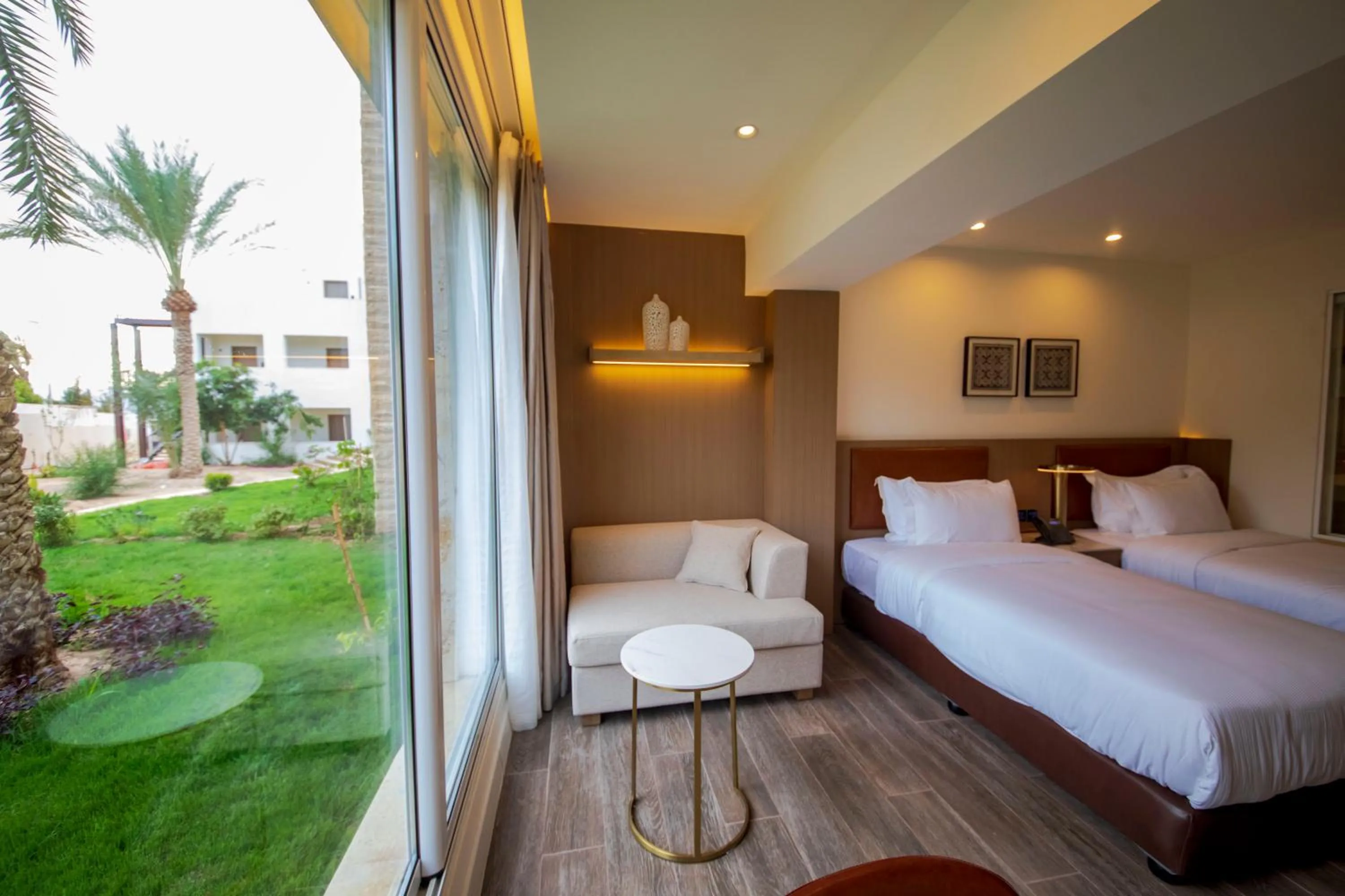 Photo of the whole room, Bed in Luxotel Aqaba Beach Resort & Spa Only 15 years plus