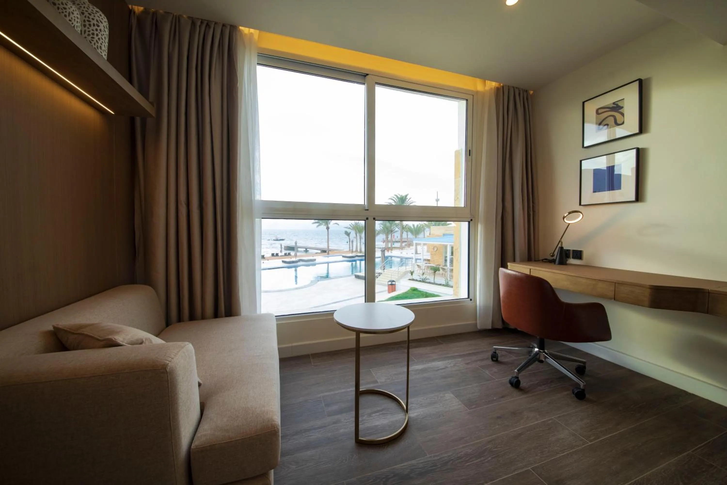 Seating area in Luxotel Aqaba Beach Resort & Spa Only 15 years plus