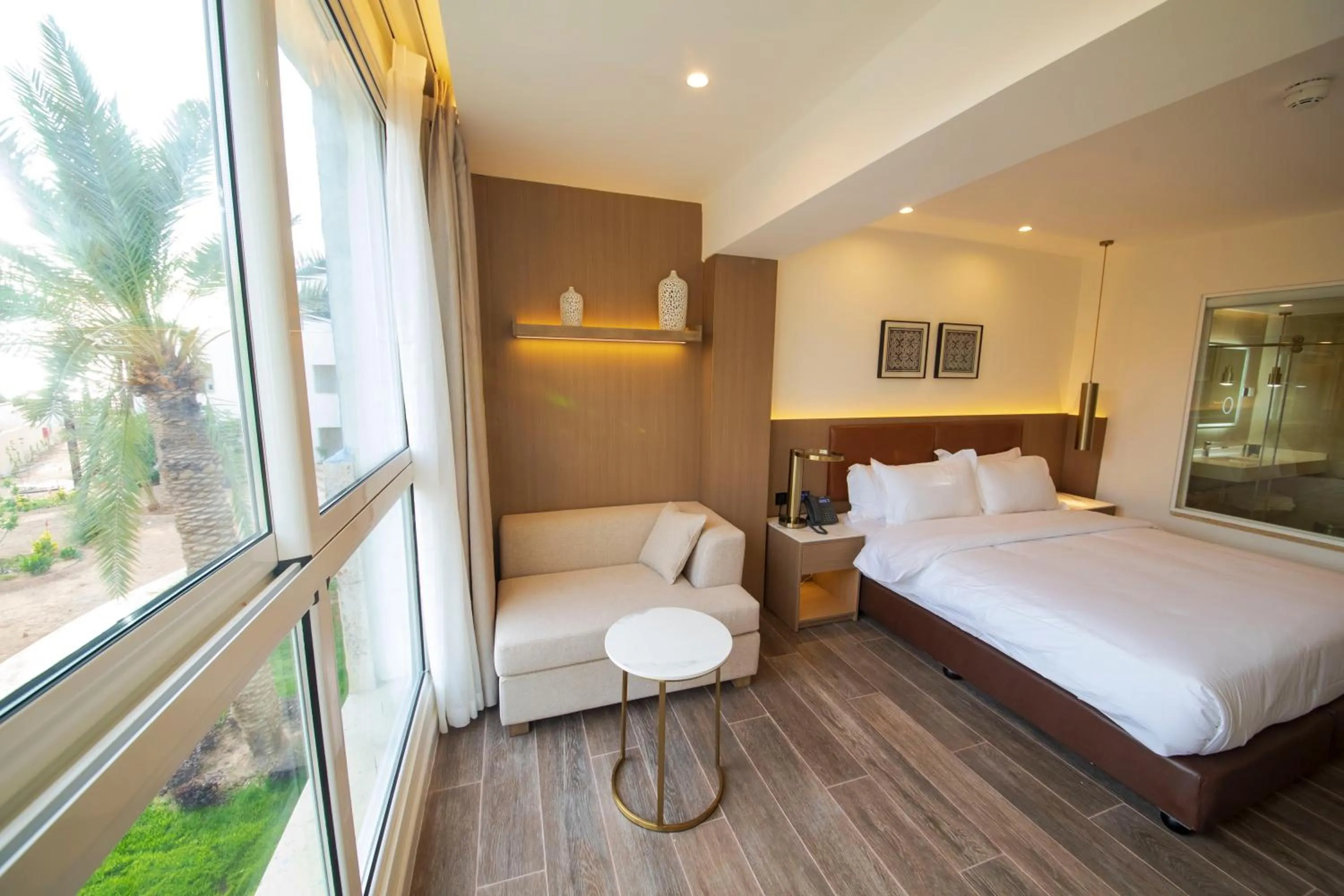 Photo of the whole room, Bed in Luxotel Aqaba Beach Resort & Spa Only 15 years plus