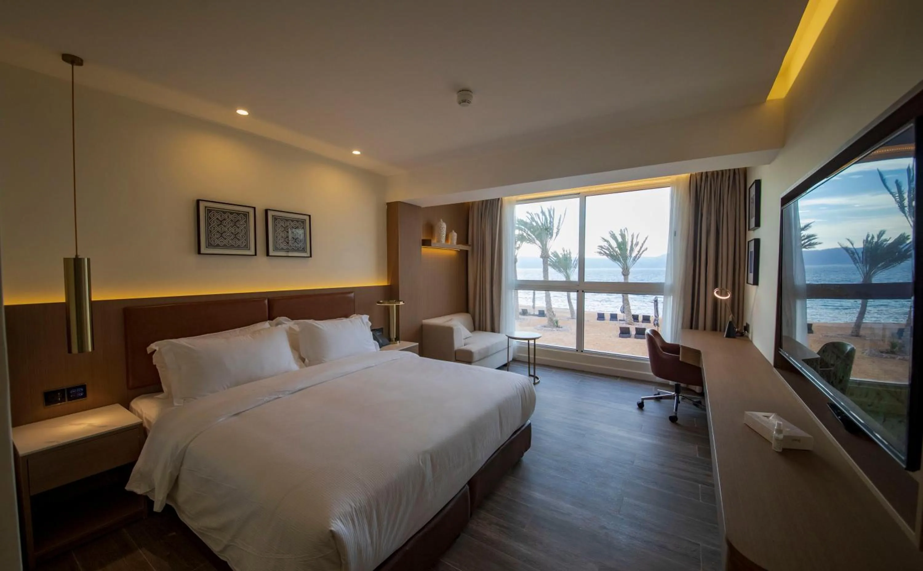 Photo of the whole room, Bed in Luxotel Aqaba Beach Resort & Spa Only 15 years plus