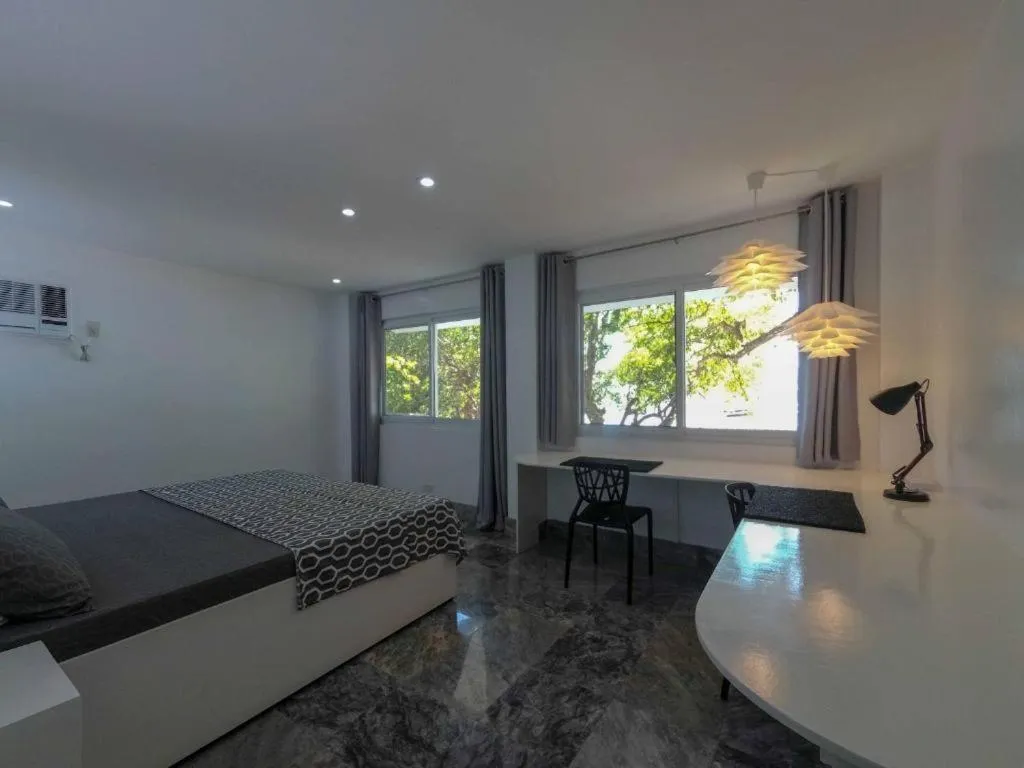 Bed in The Three P Beach Resort & Dive Center