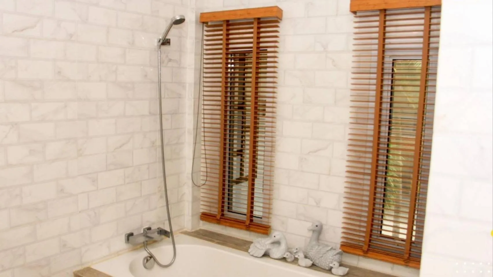 Shower in Aura Samui Best Beach Hotel - SHA Plus