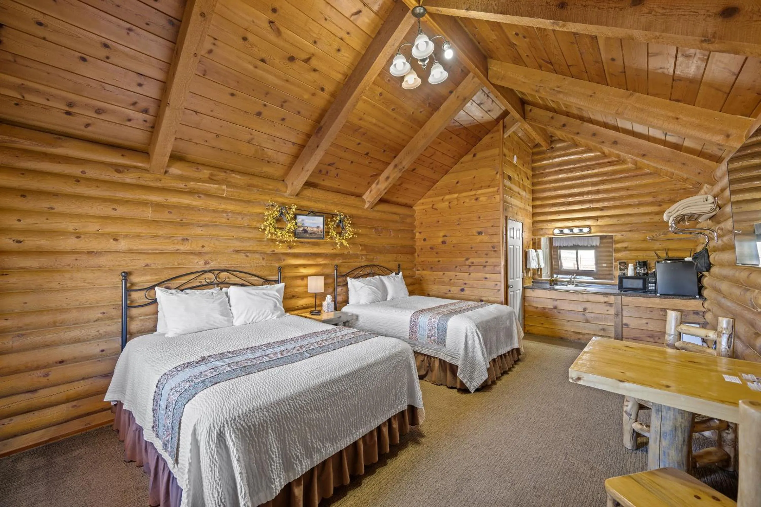 Bedroom, Bed in Bryce Canyon Log Cabins