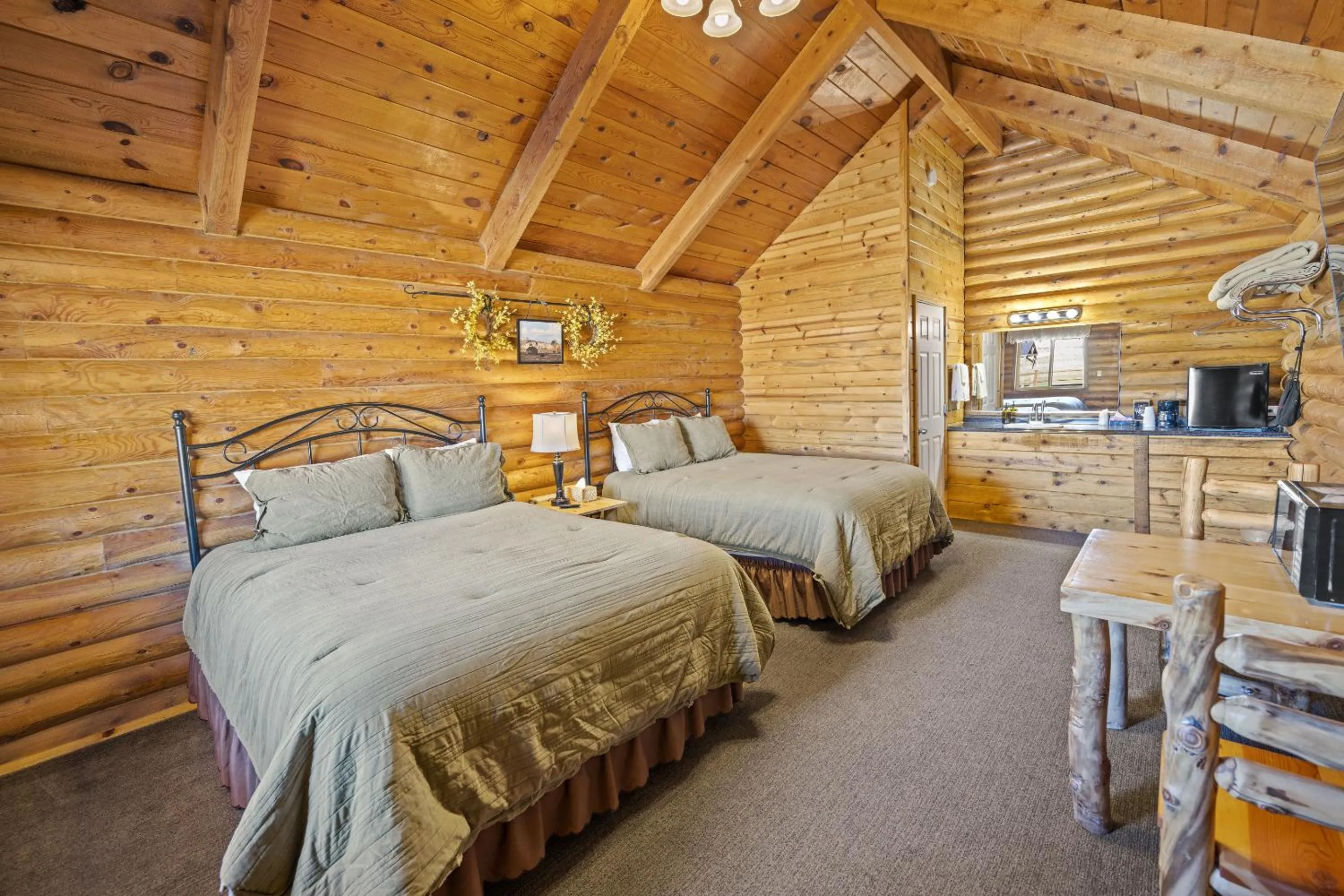 Bedroom, Bed in Bryce Canyon Log Cabins