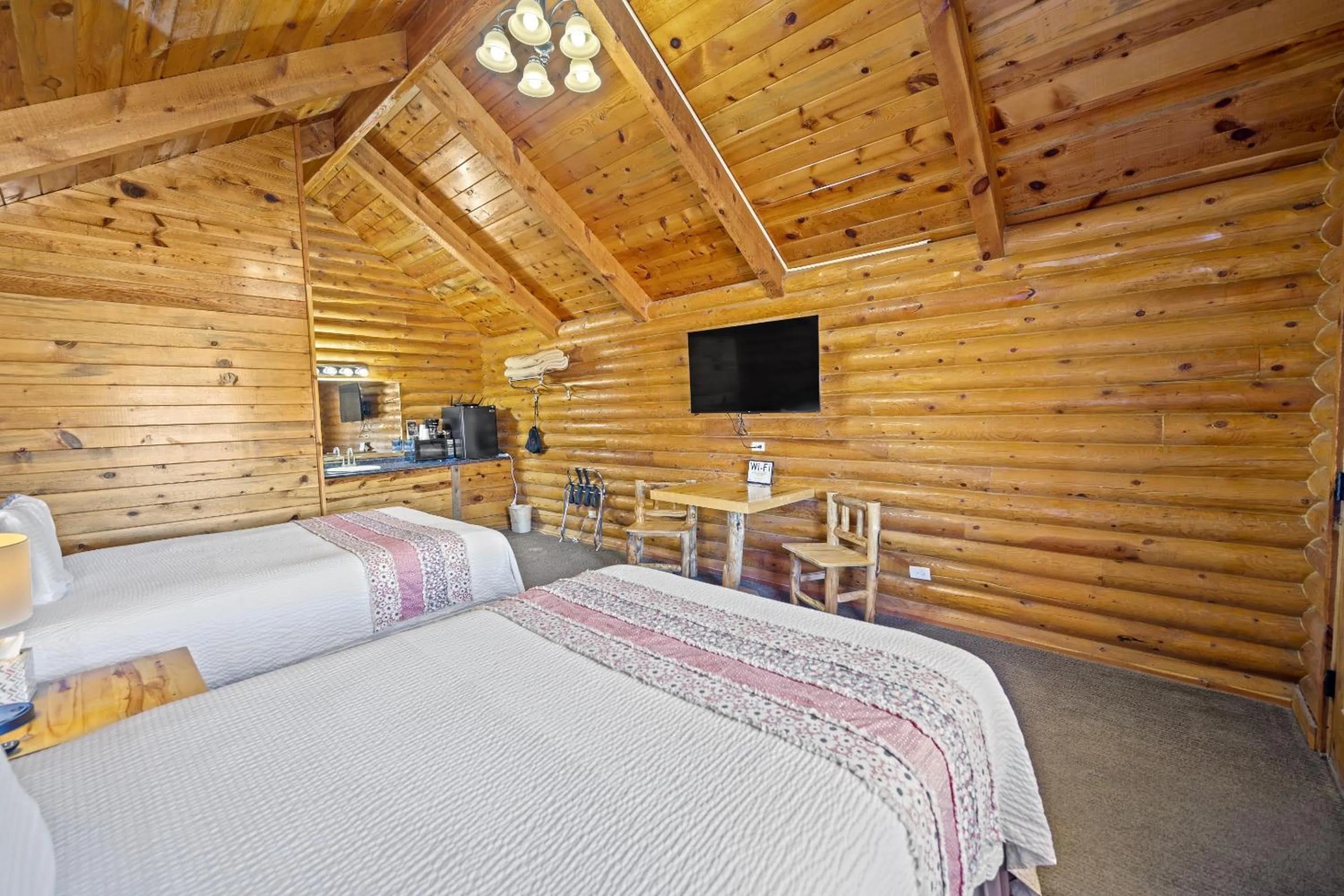 Bedroom, Bed in Bryce Canyon Log Cabins