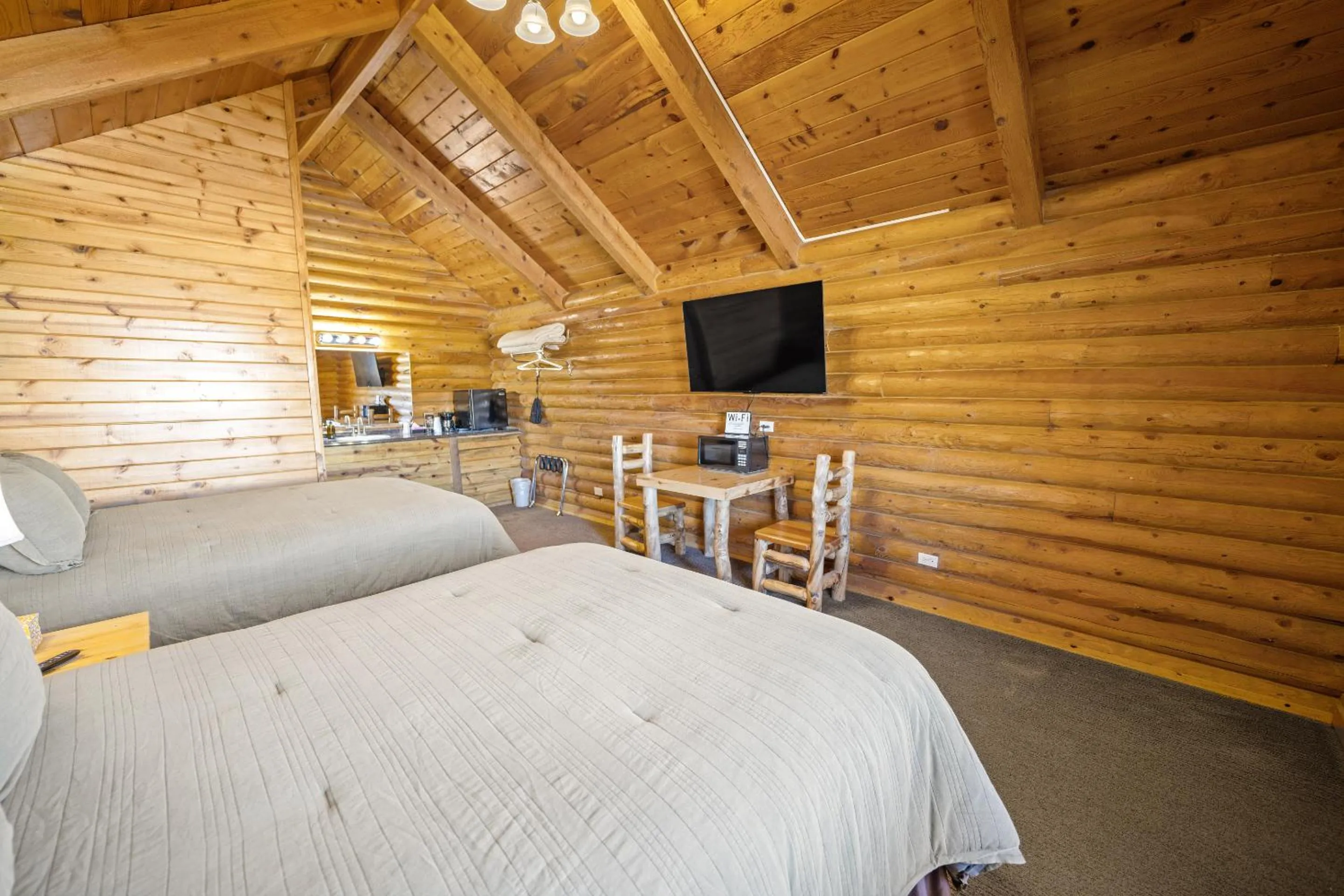 Bedroom, Bed in Bryce Canyon Log Cabins