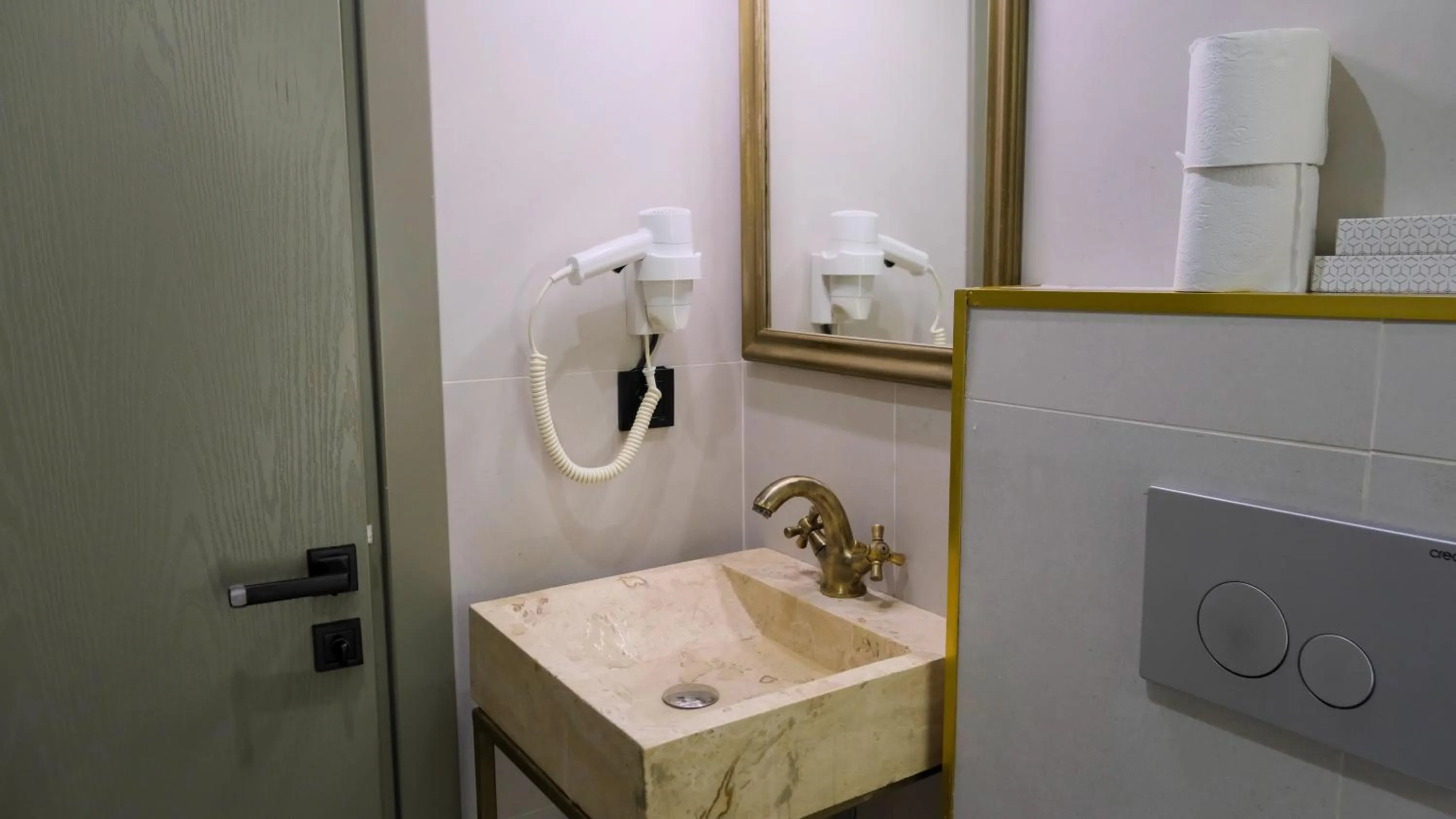 Bathroom in By Kinyas Hotel