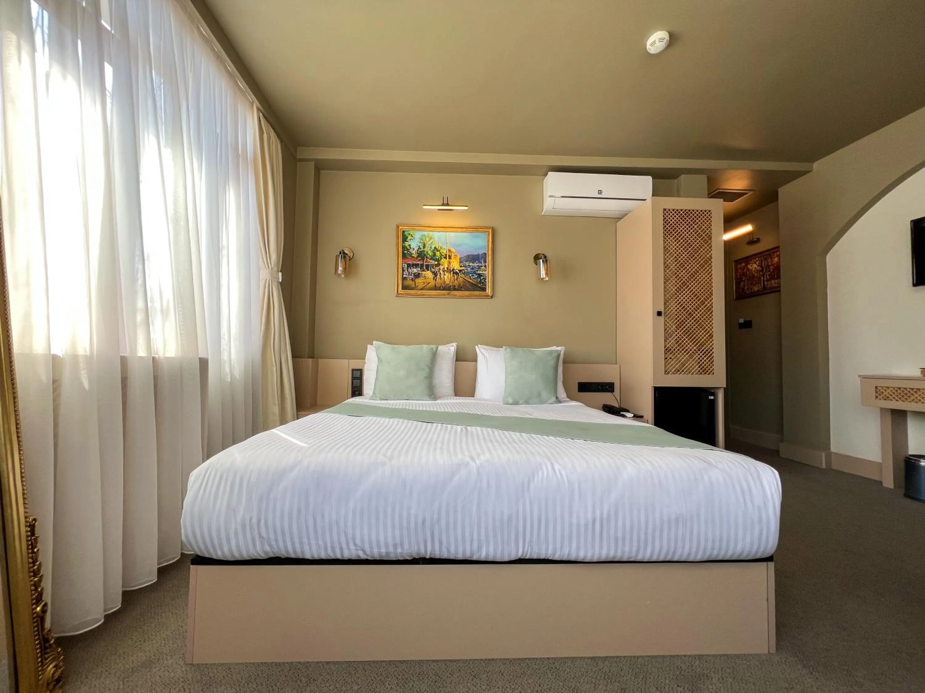 Bedroom in By Kinyas Hotel