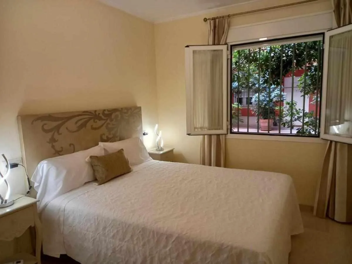 Bedroom, Bed in Apartamento sauceda 7