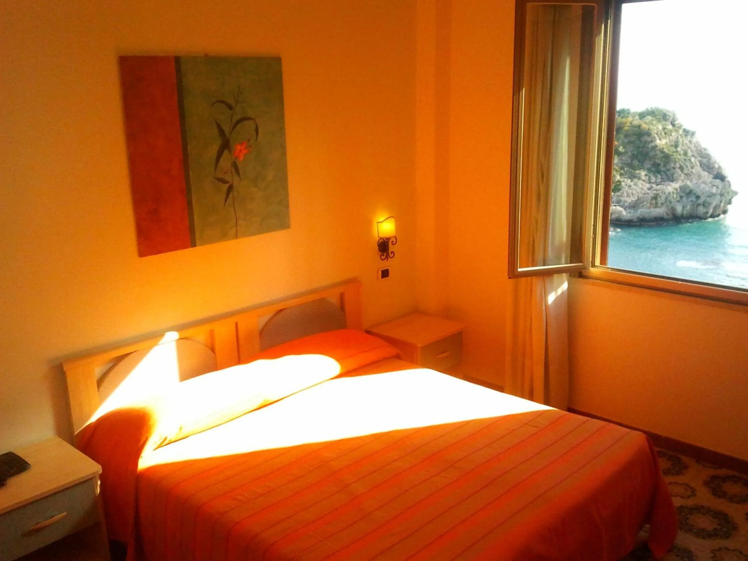 Photo of the whole room, Bed in Jonic Hotel Mazzarò