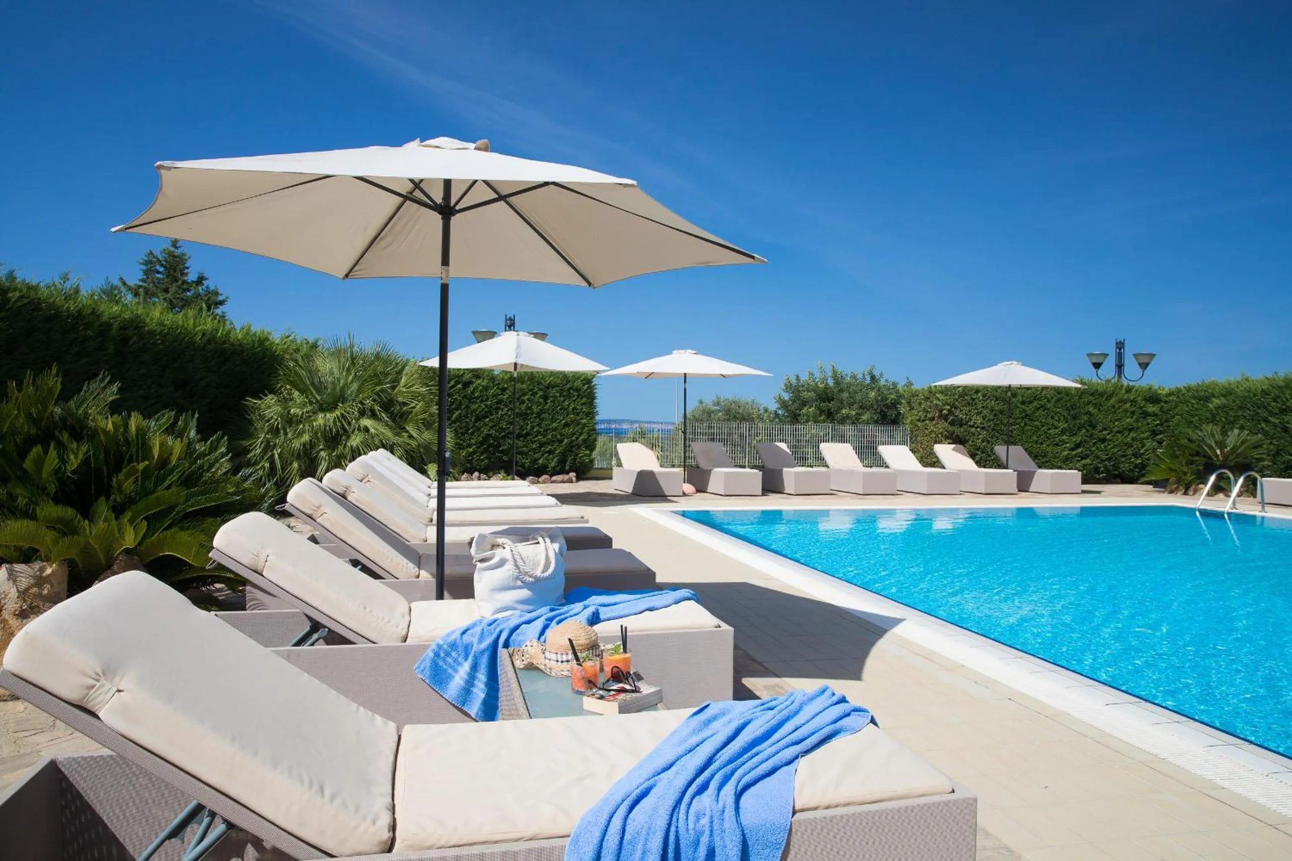 Swimming pool in Lu' Hotel Porto Pino