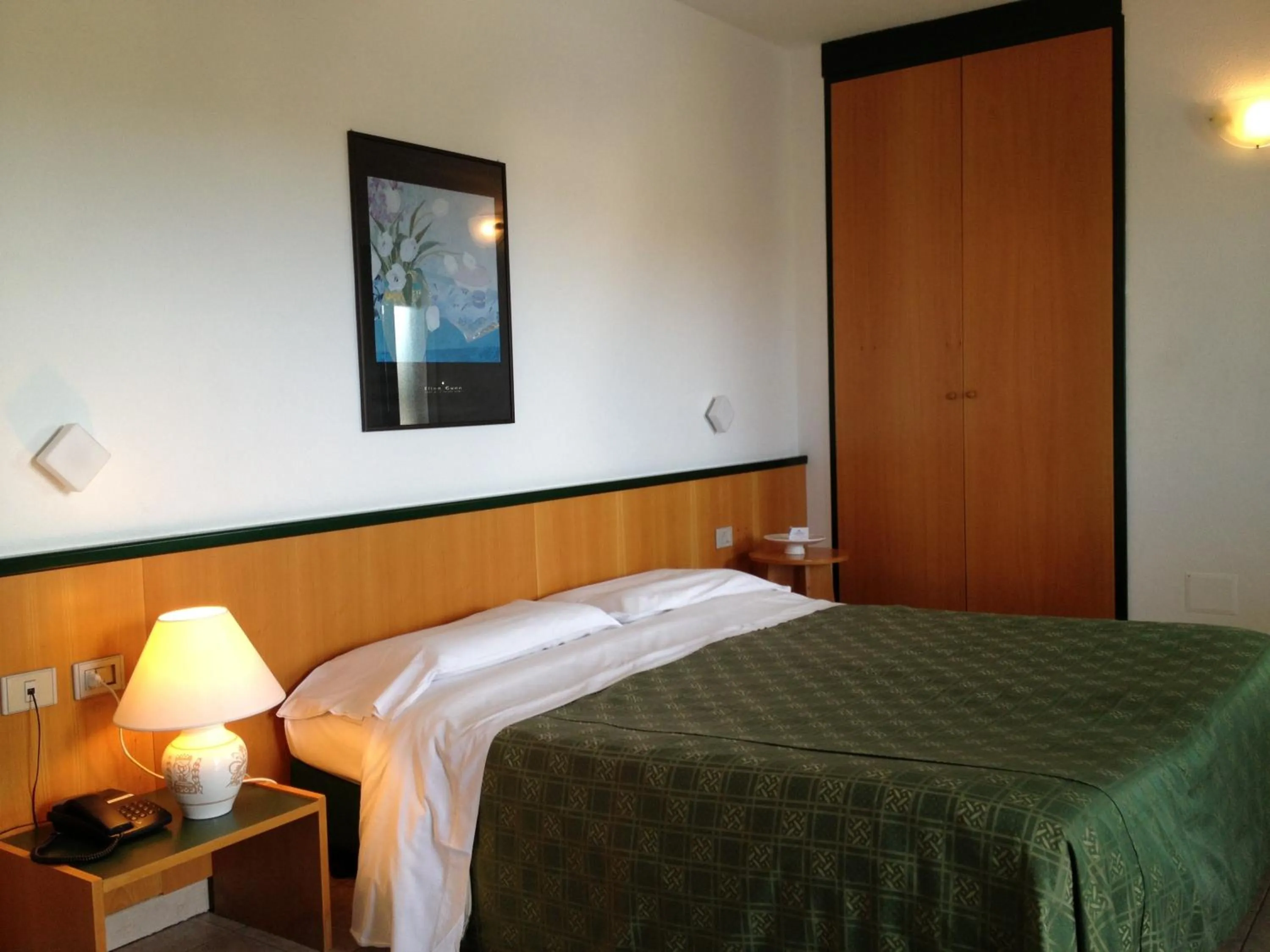 Bedroom in Hotel Ambrosio La Corte