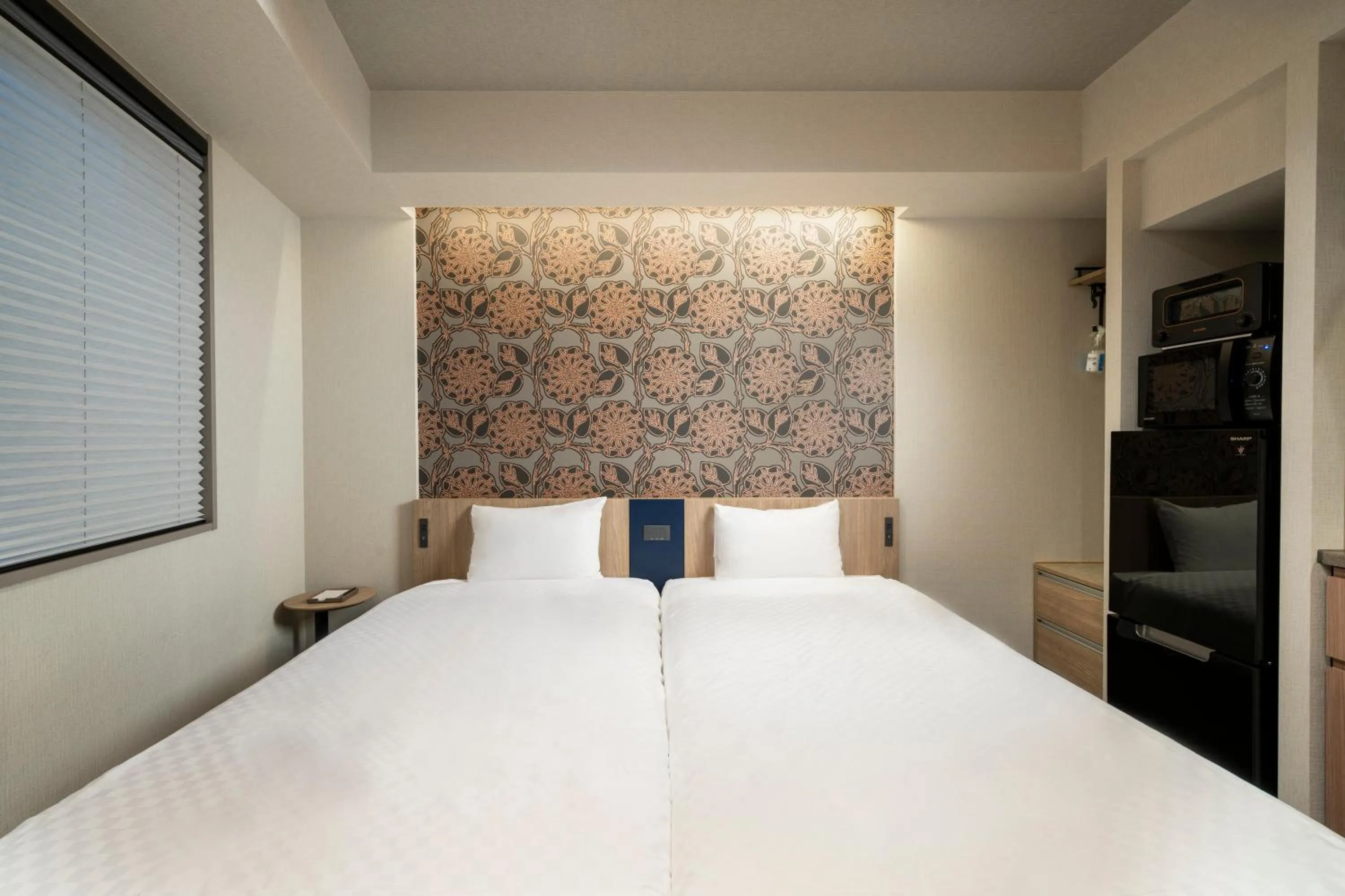 Bed in KOKO HOTEL Residence Asakusa Tawaramachi