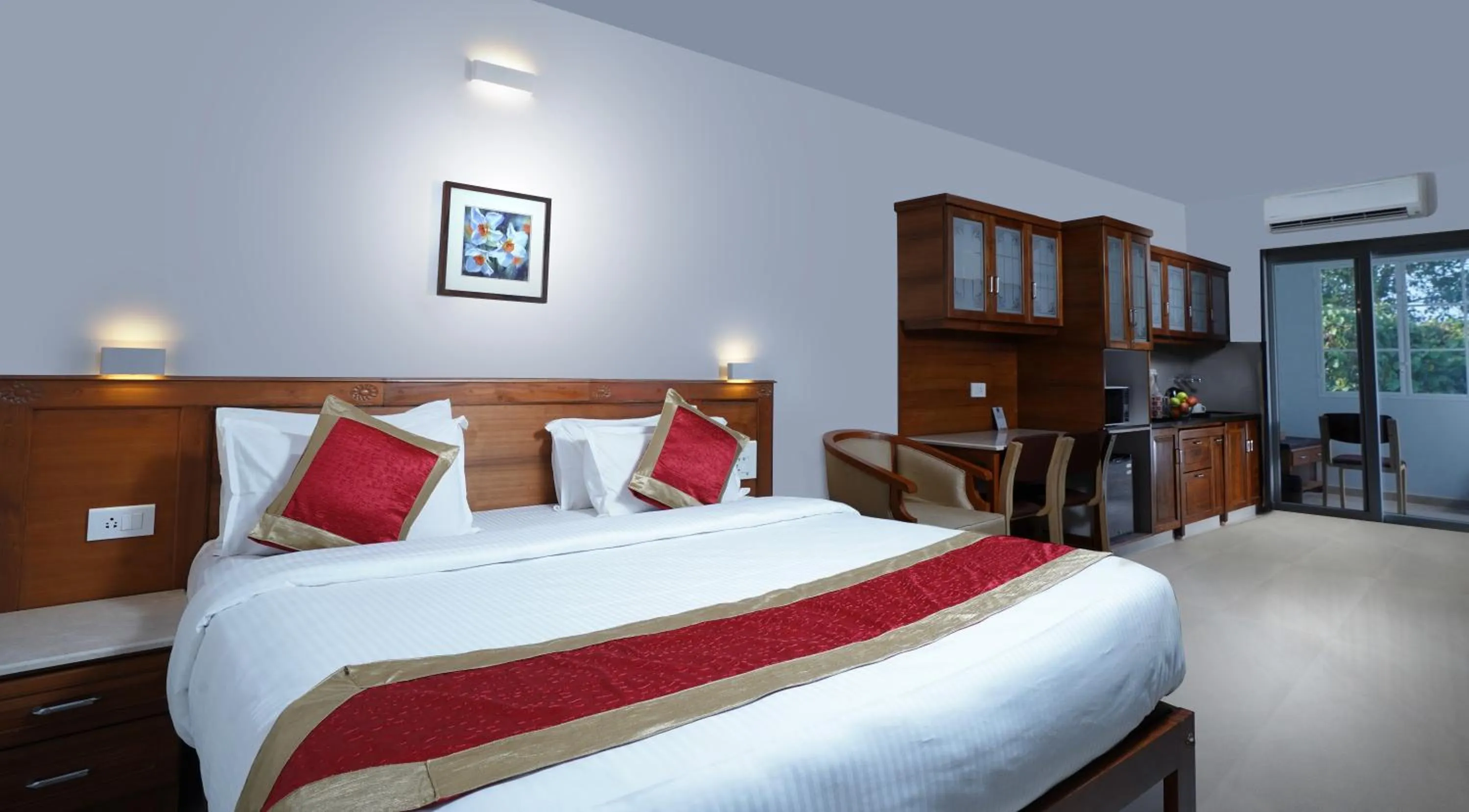 Dining area, Bed in TGR SUITES