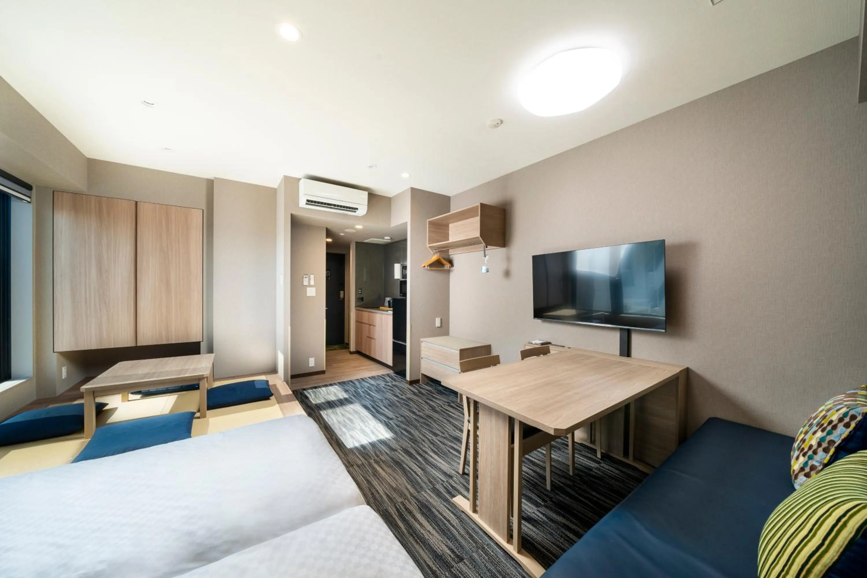 Photo of the whole room, Bed in KOKO HOTEL Residence Asakusa Kappabashi