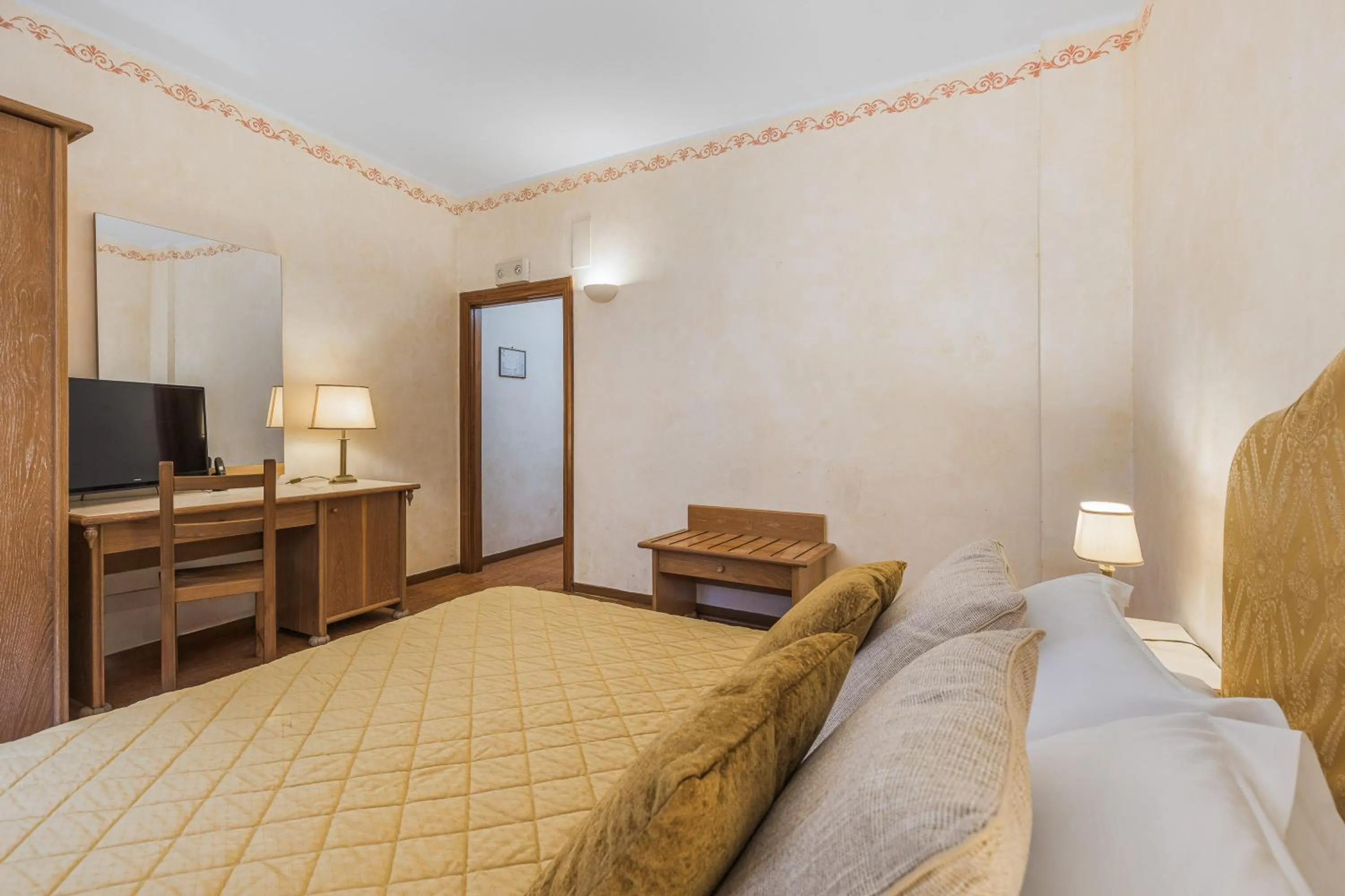 Bed in Relais La Fattoria